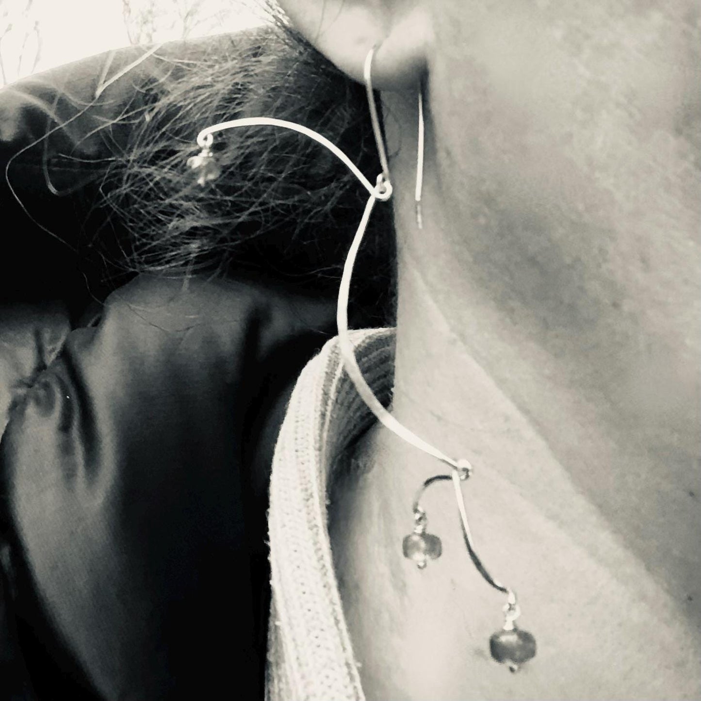 Kinetic sculptural tanzanite earrings in argentium sterling silver // Long Calder Earrings