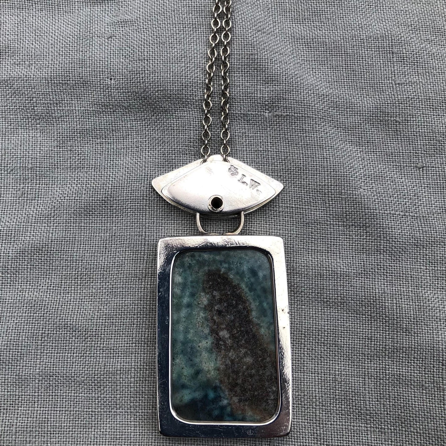 Opalized fossilized wood pendant in argentium sterling silver // Whale flipper necklace