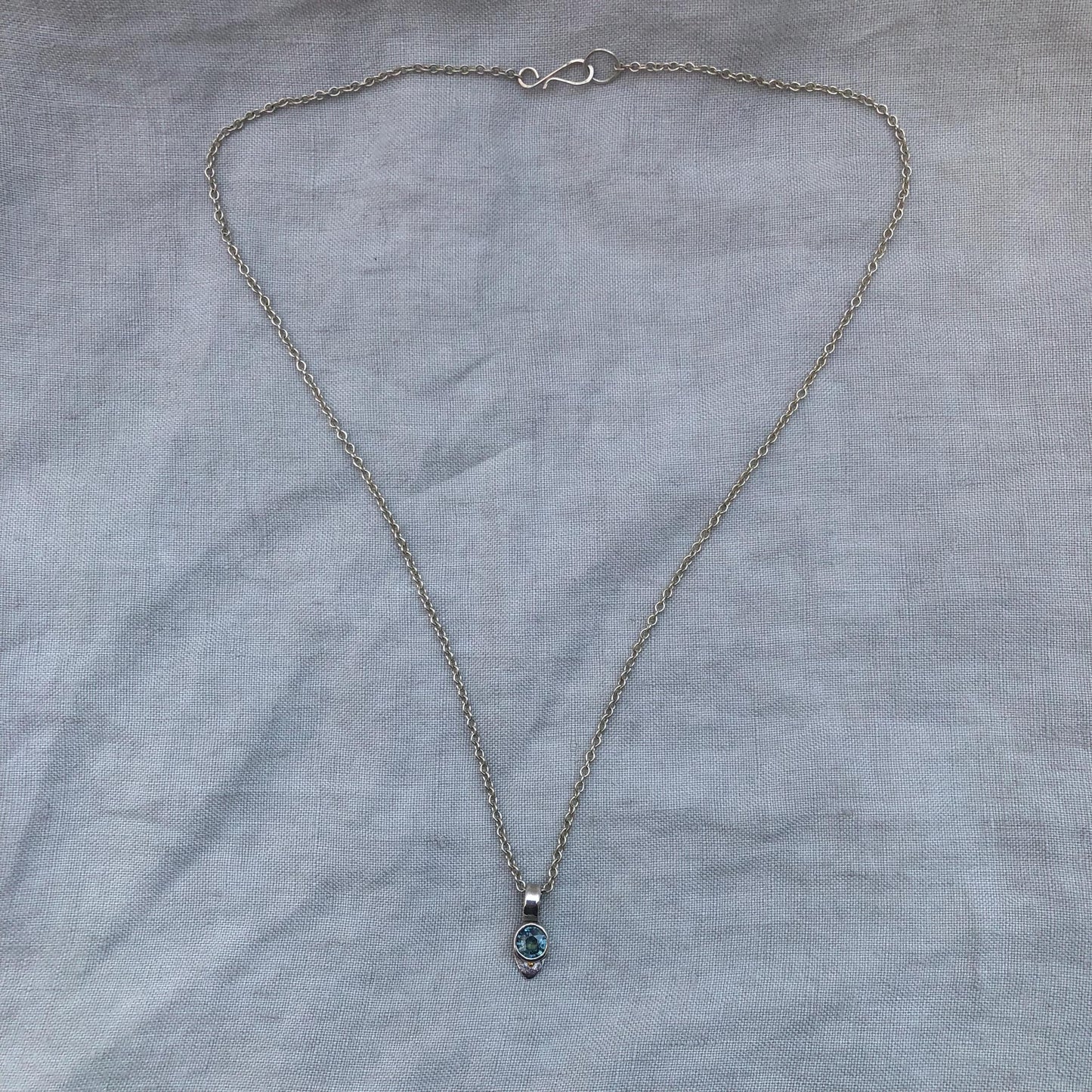 Natural earth-mined sapphire pendant with 24K gold dot in argentium sterling silver