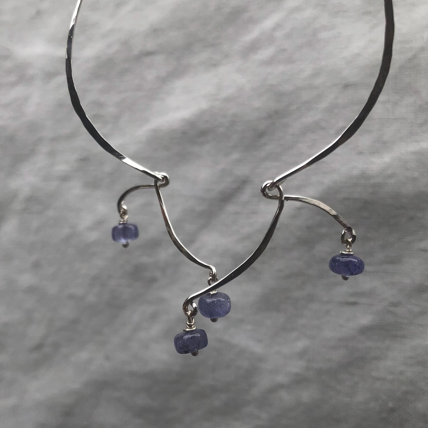Kinetic sculptural tanzanite earrings in argentium sterling silver // Long Calder Earrings