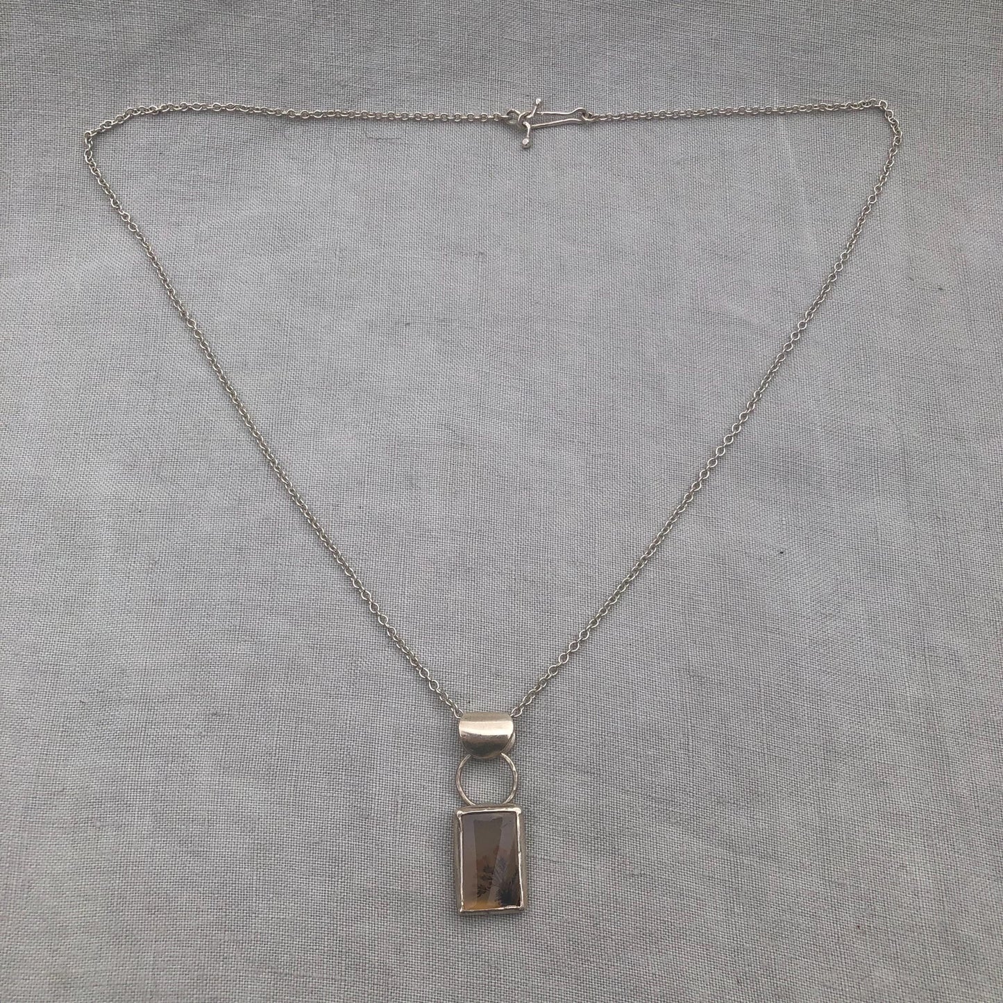 Dendritic agate pendant in argentium sterling silver // "Disappearing" dendritic agate pendant