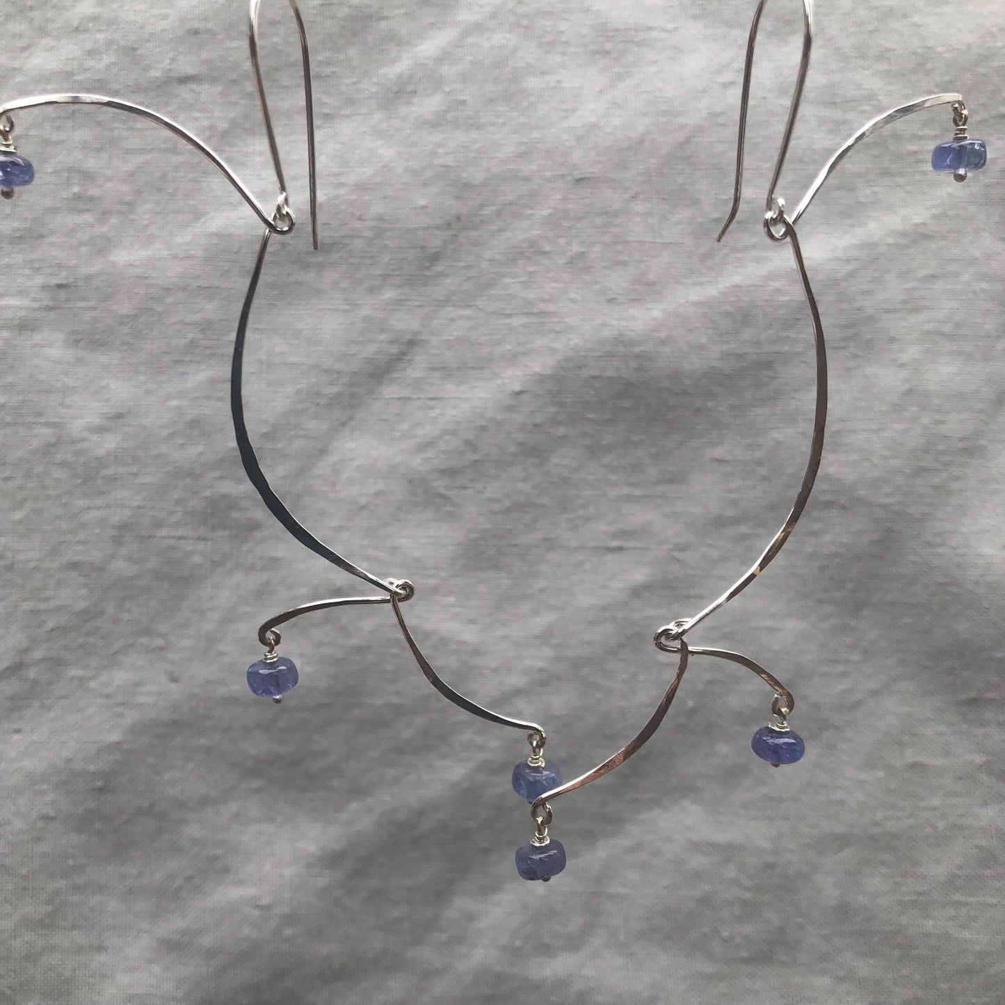 Kinetic sculptural tanzanite earrings in argentium sterling silver // Long Calder Earrings
