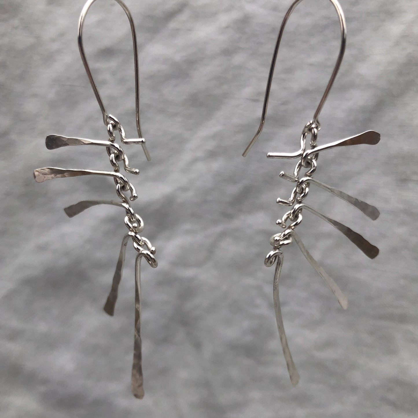 Kinetic sculptural earrings in argentium sterling silver // Bare Bones Earrings