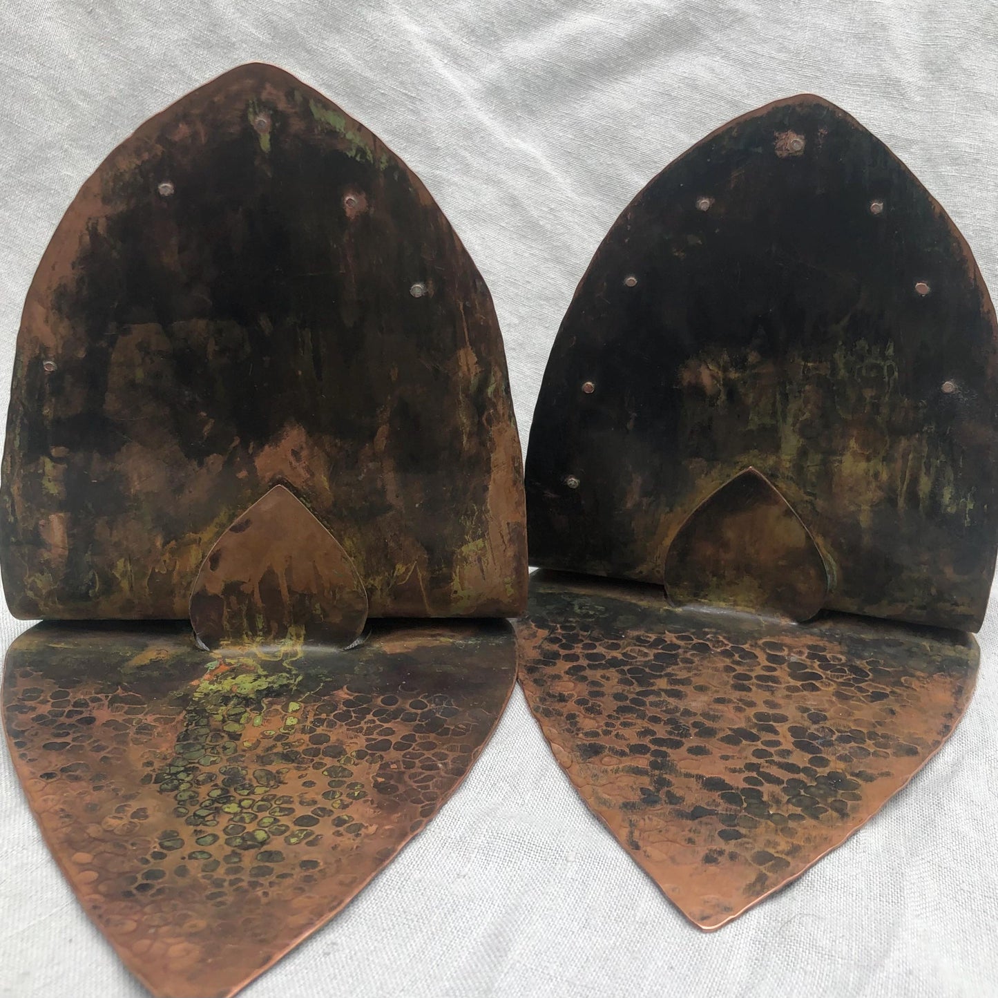 Riveted copper bookends with verdigris patina