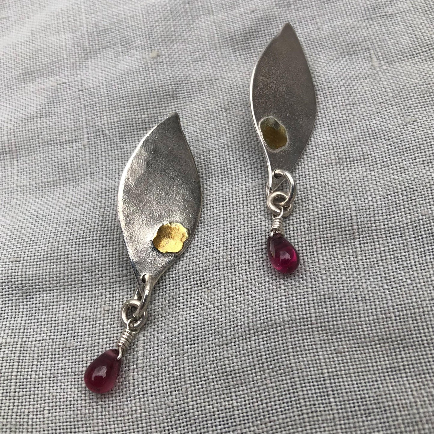 Mixed-metal garnet earrings in argentium sterling silver and 24 karat gold