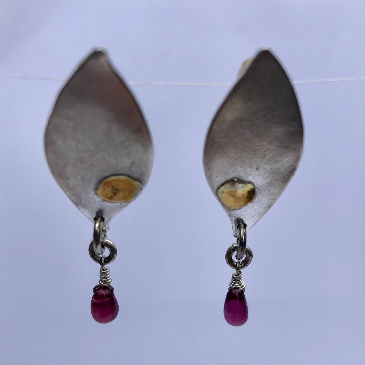 Mixed-metal garnet earrings in argentium sterling silver and 24 karat gold