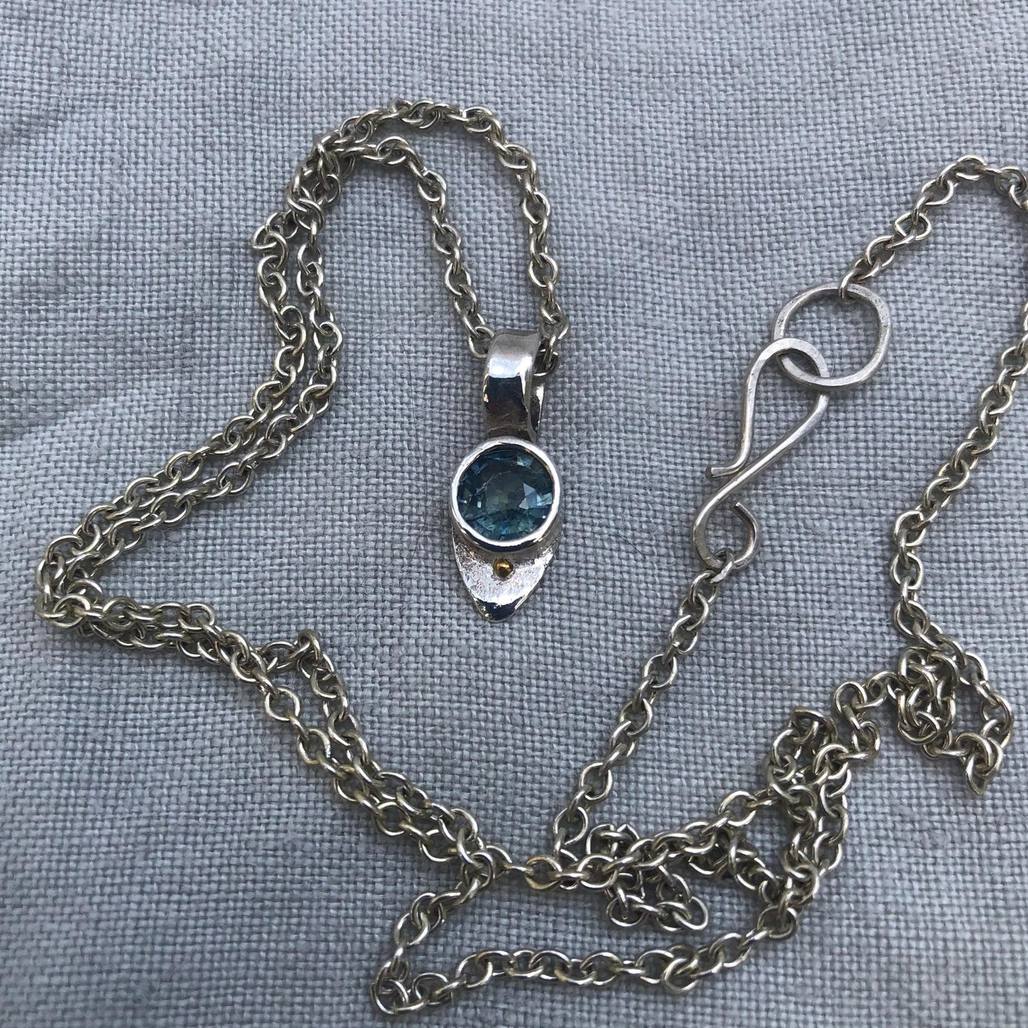 Natural earth-mined sapphire pendant with 24K gold dot in argentium sterling silver
