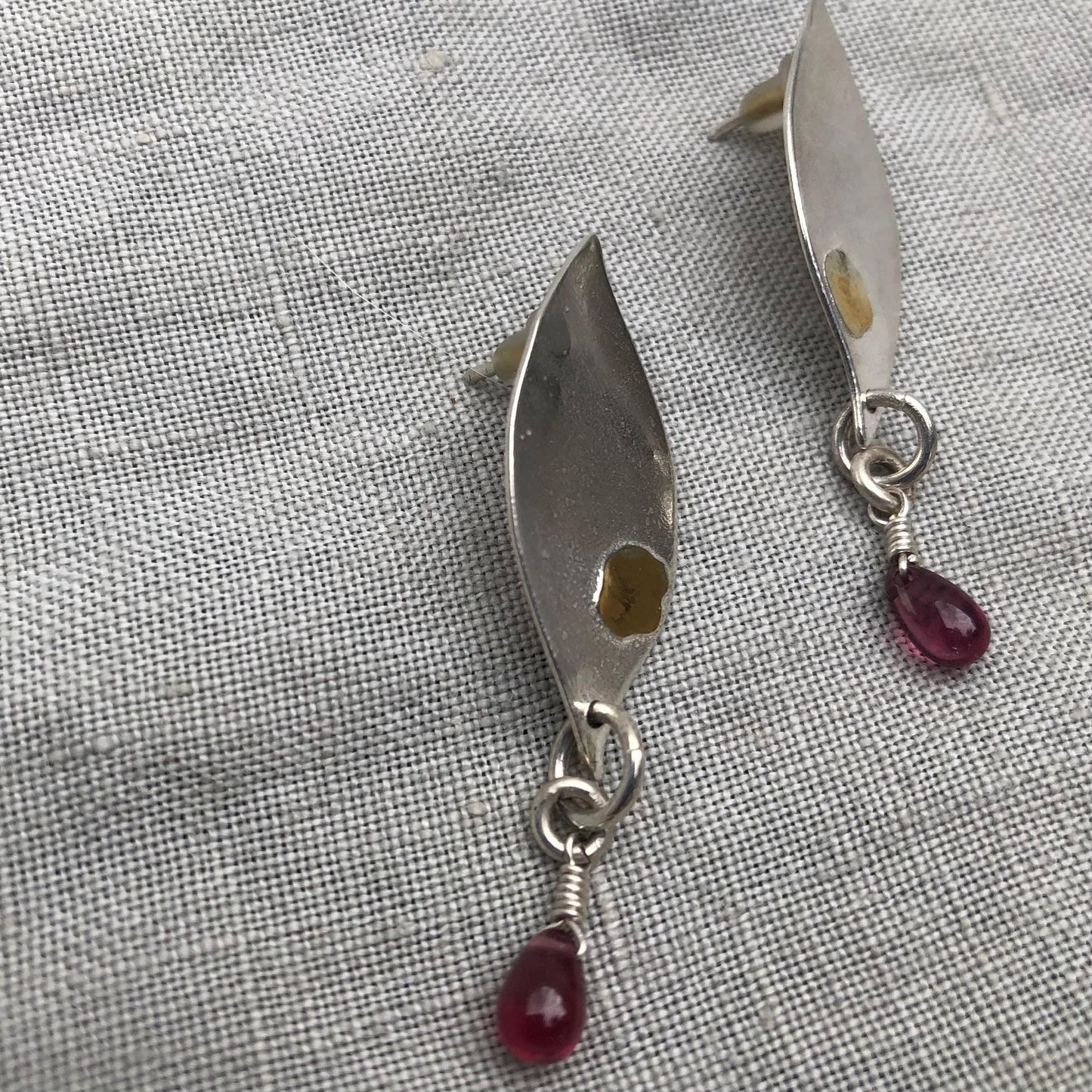 Mixed-metal garnet earrings in argentium sterling silver and 24 karat gold