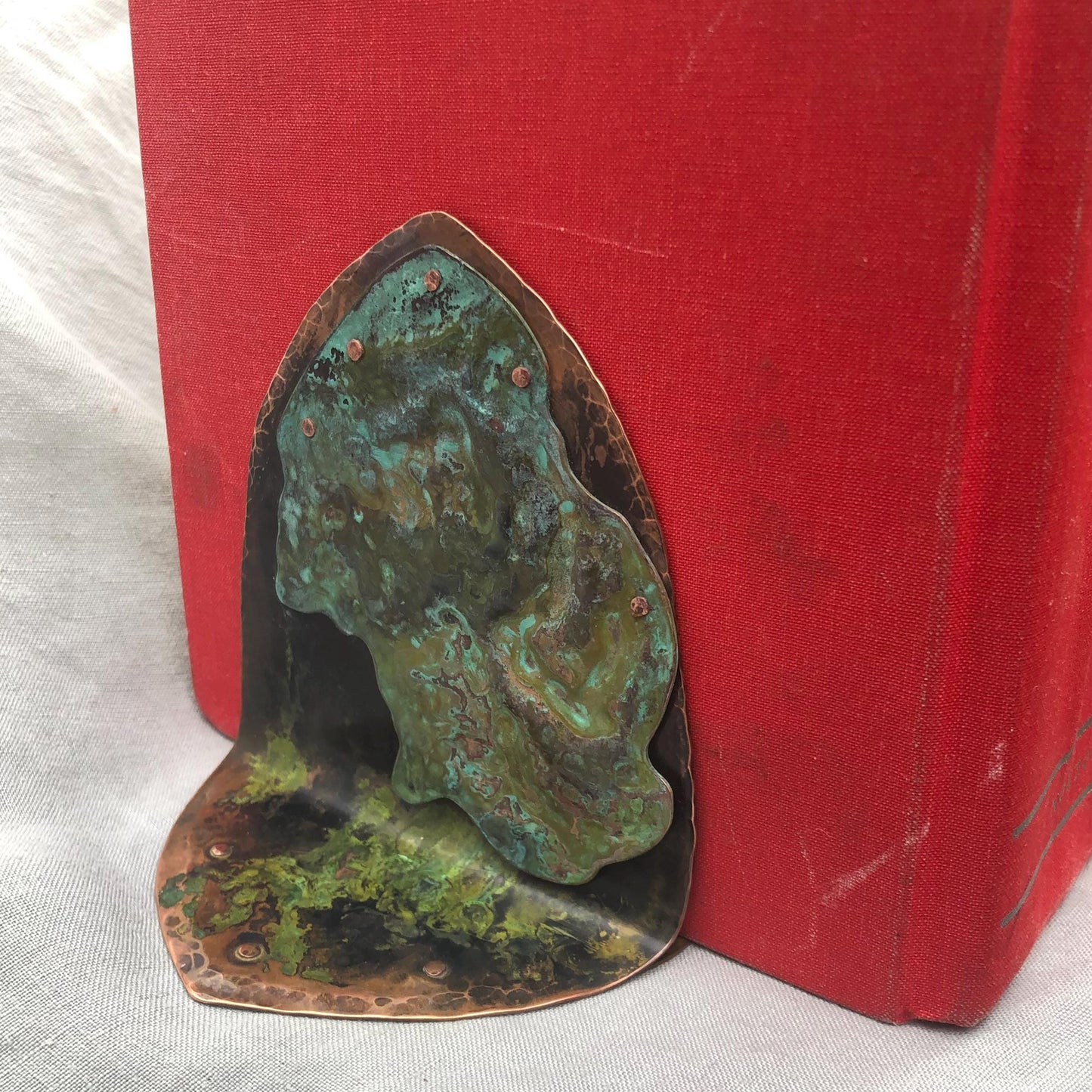 Riveted copper bookends with verdigris patina