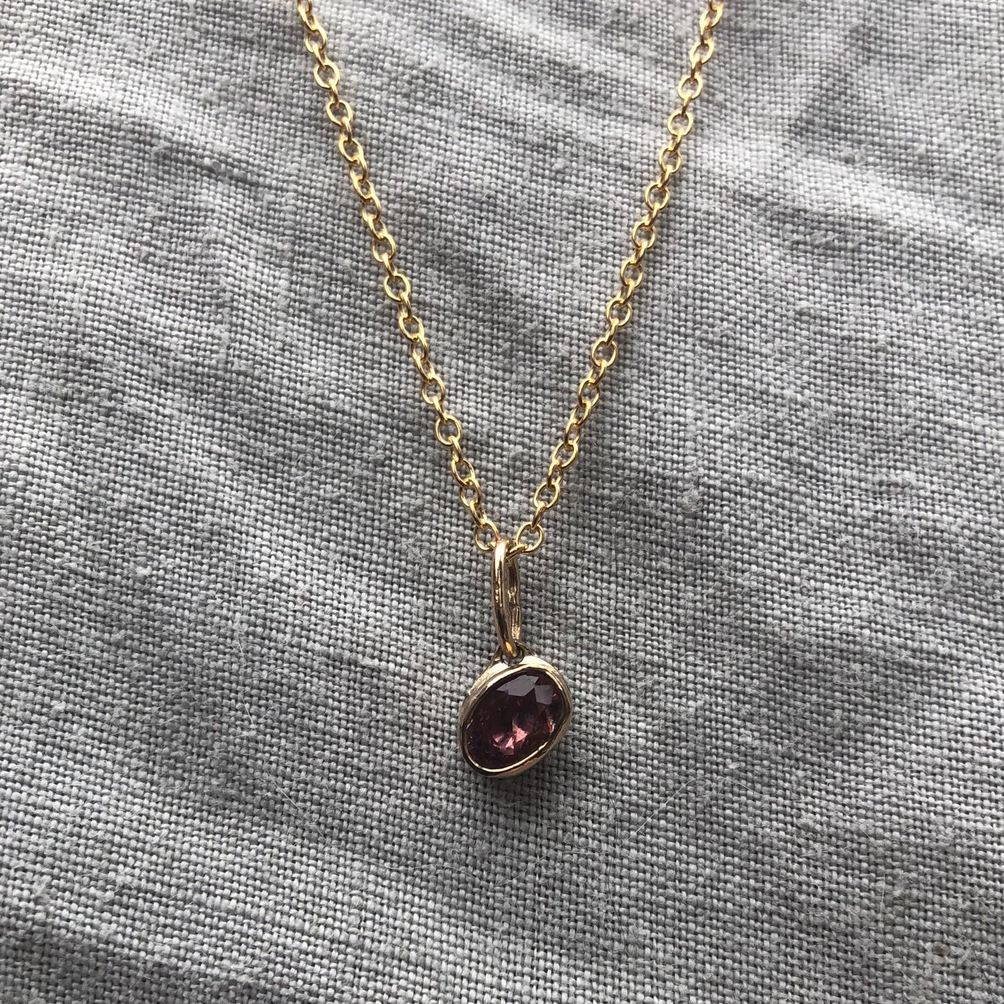 Solid gold padparadscha sapphire charm pendant // Asymmetrical unheated pink sapphire 14 karat gold necklace