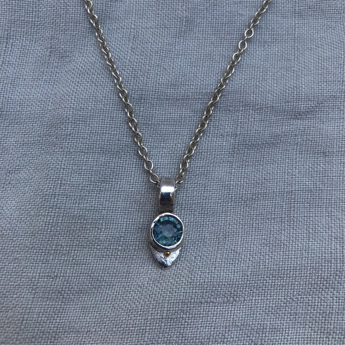 Natural earth-mined sapphire pendant with 24K gold dot in argentium sterling silver