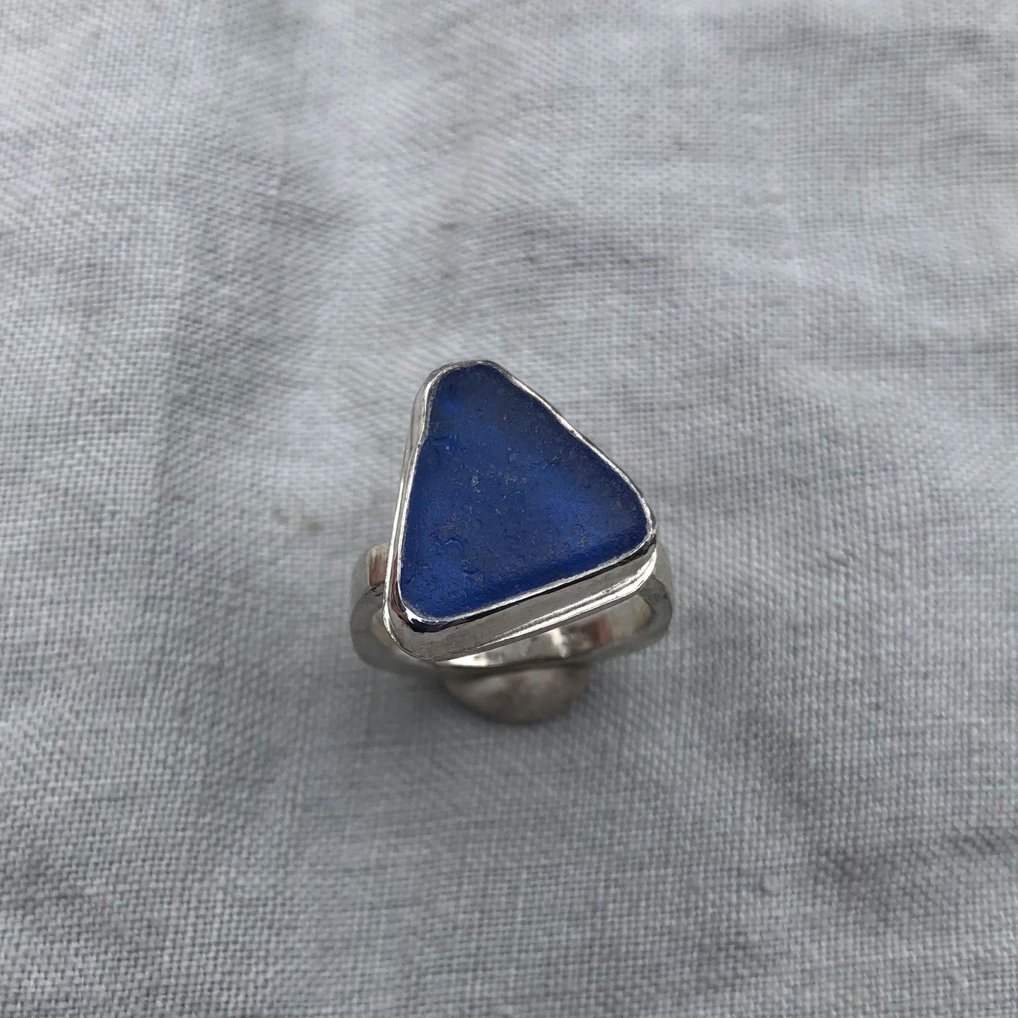 Blue sea glass ring in argentium sterling silver // Found beach glass ring with a contoured band // U.S. size 5