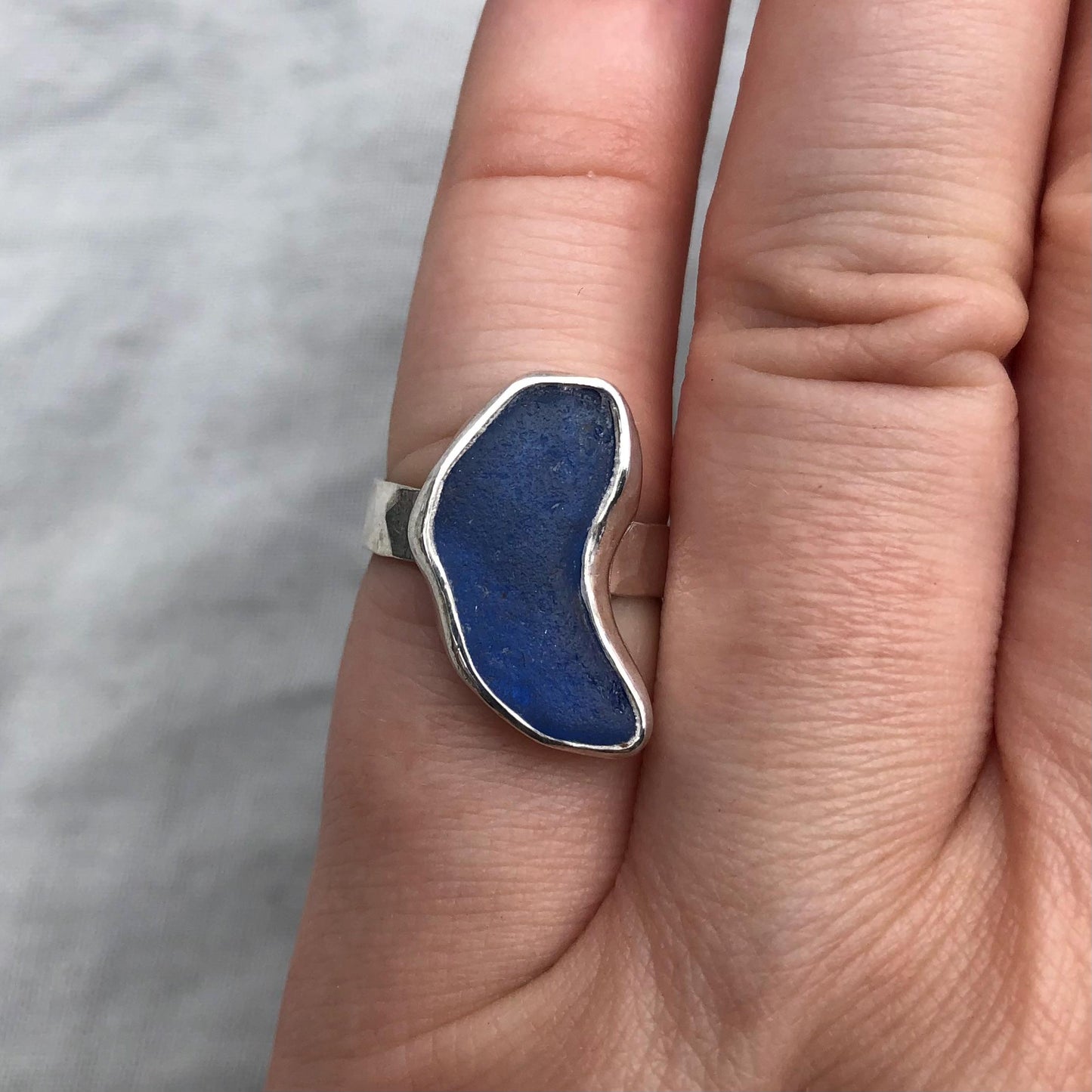Freeform blue sea glass ring in argentium sterling silver // Bean-shaped found beach glass ring // U.S. size 5