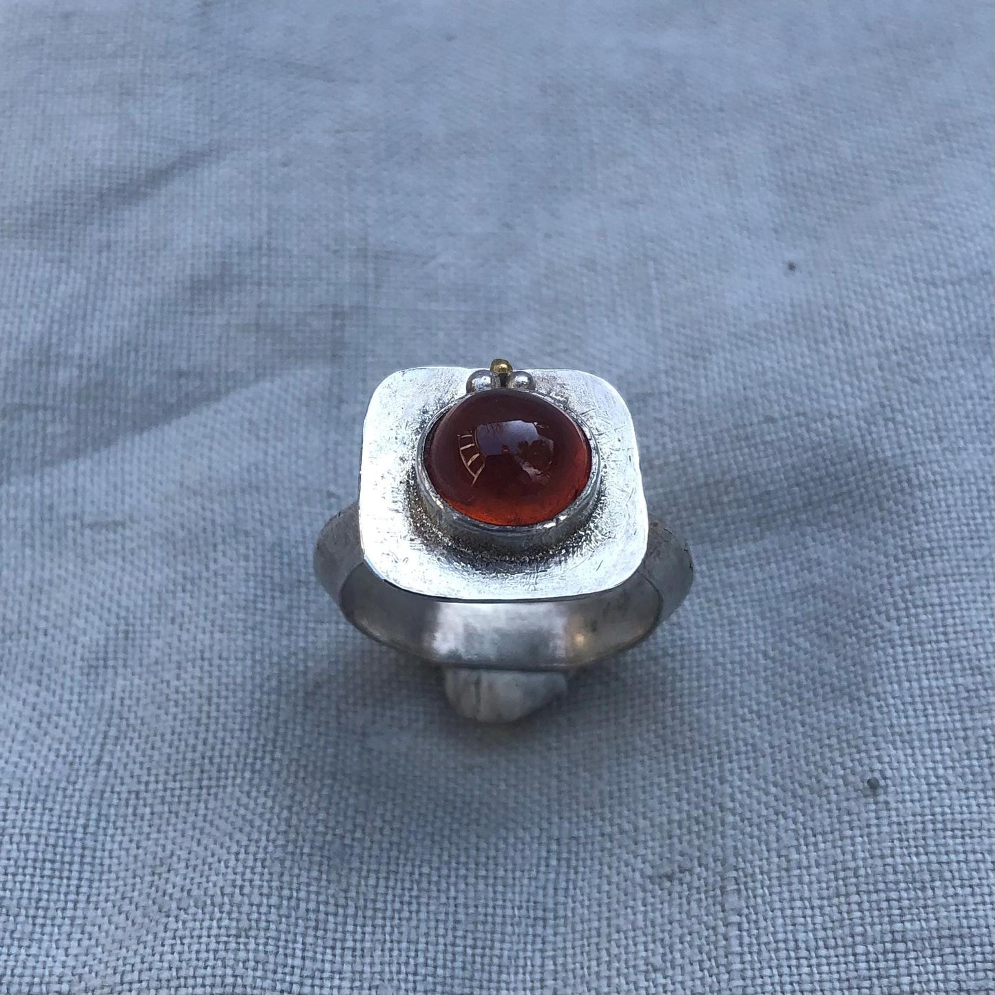 Fanta garnet ring in argentium silver and 24K gold, U.S. size 6 1/4