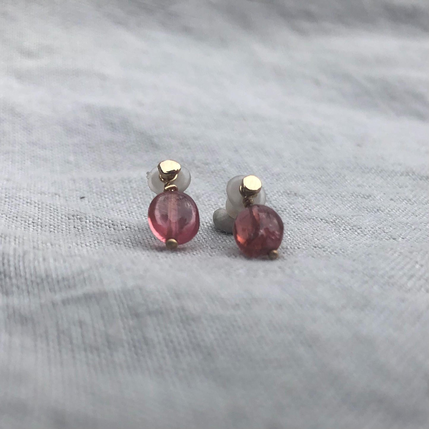 Solid gold stud earrings with removable pink tourmaline gemstones