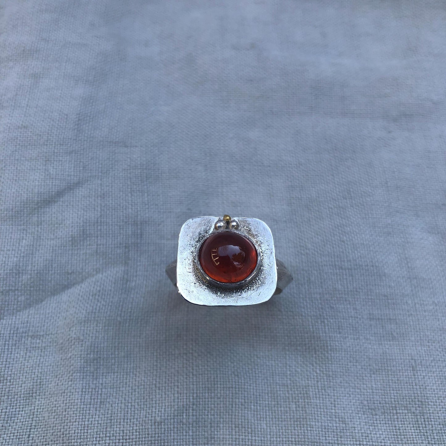 Fanta garnet ring in argentium silver and 24K gold, U.S. size 6 1/4