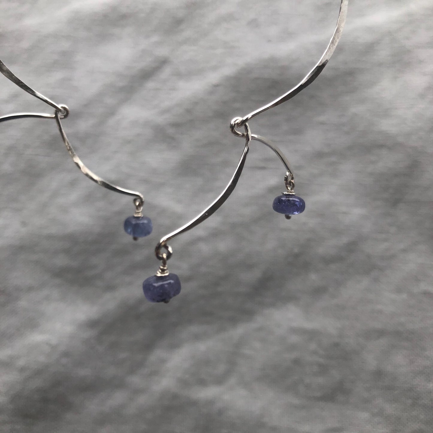 Kinetic sculptural tanzanite earrings in argentium sterling silver // Long Calder Earrings