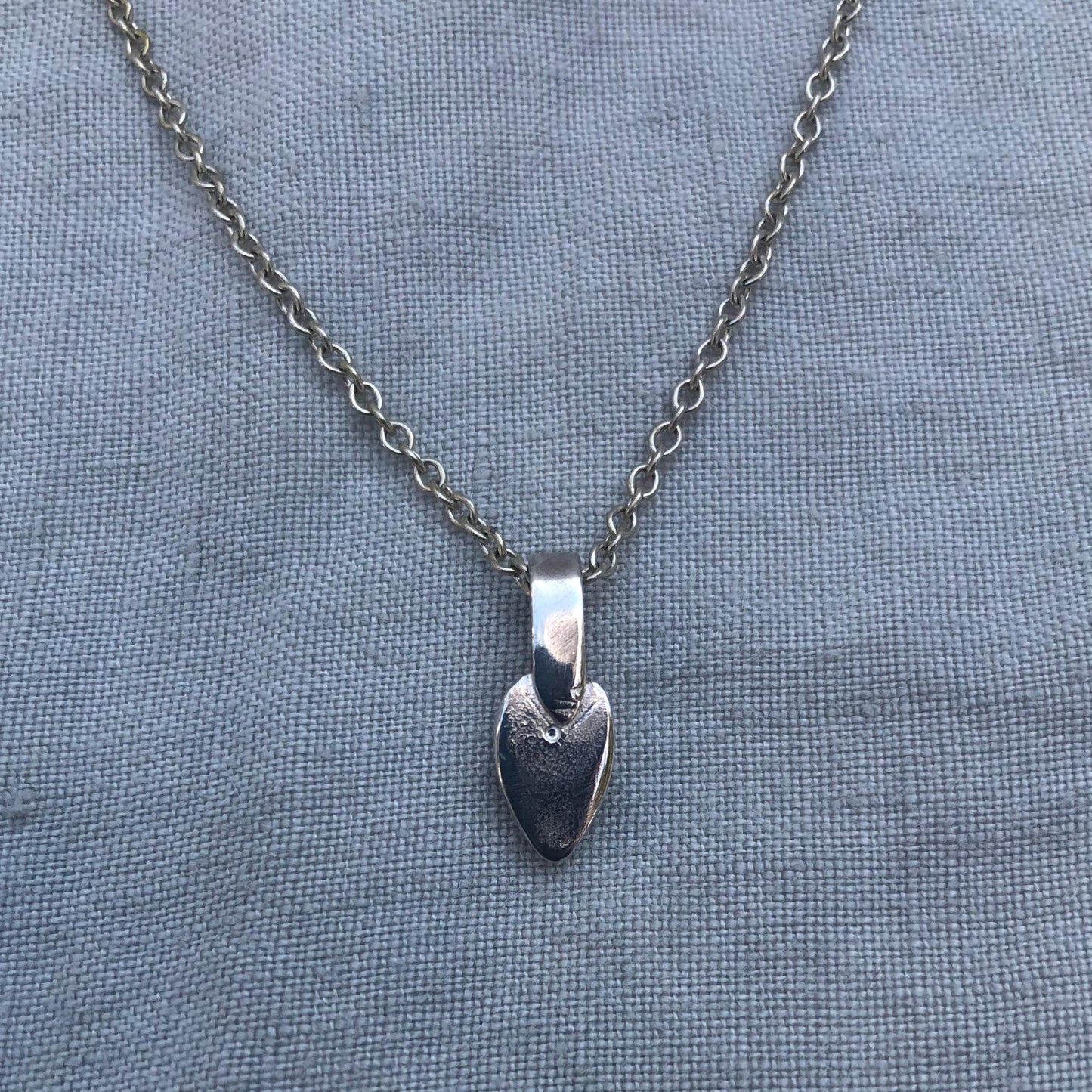 Natural earth-mined sapphire pendant with 24K gold dot in argentium sterling silver