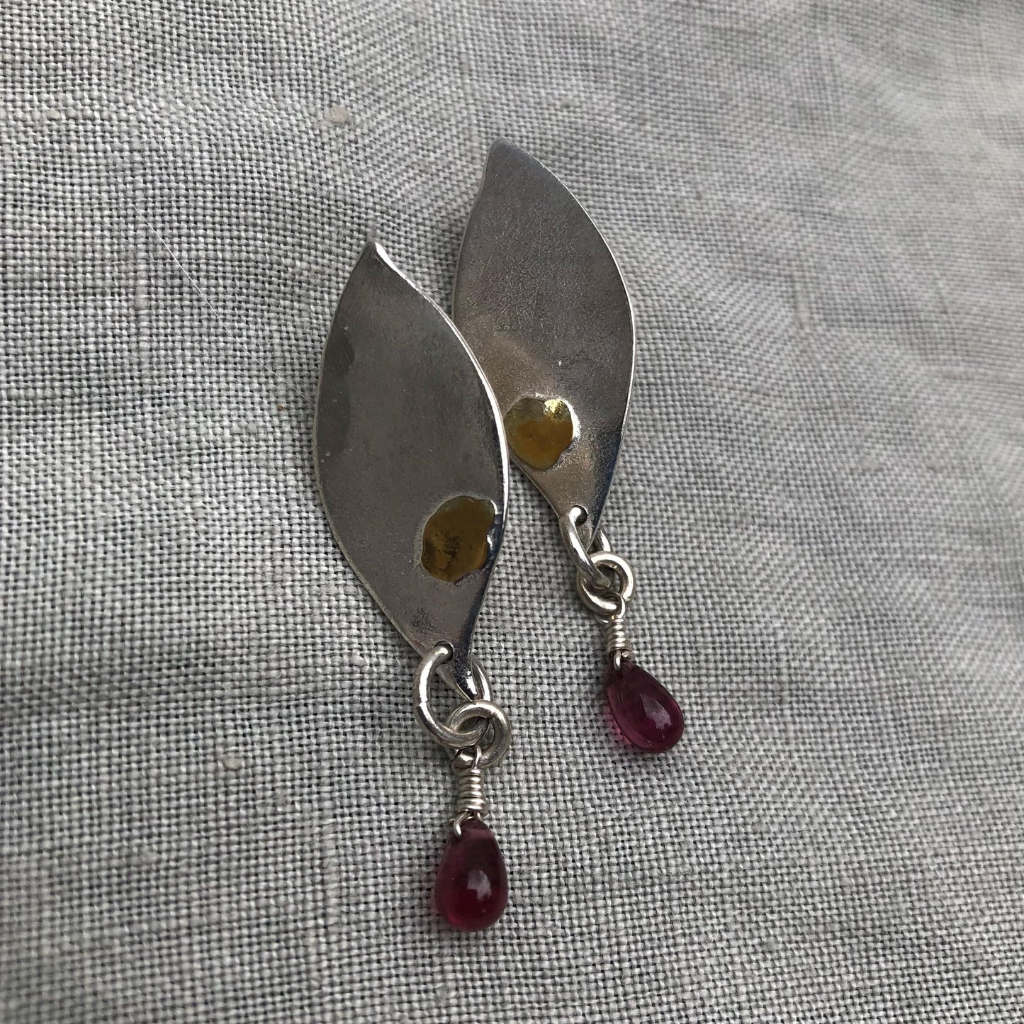Mixed-metal garnet earrings in argentium sterling silver and 24 karat gold