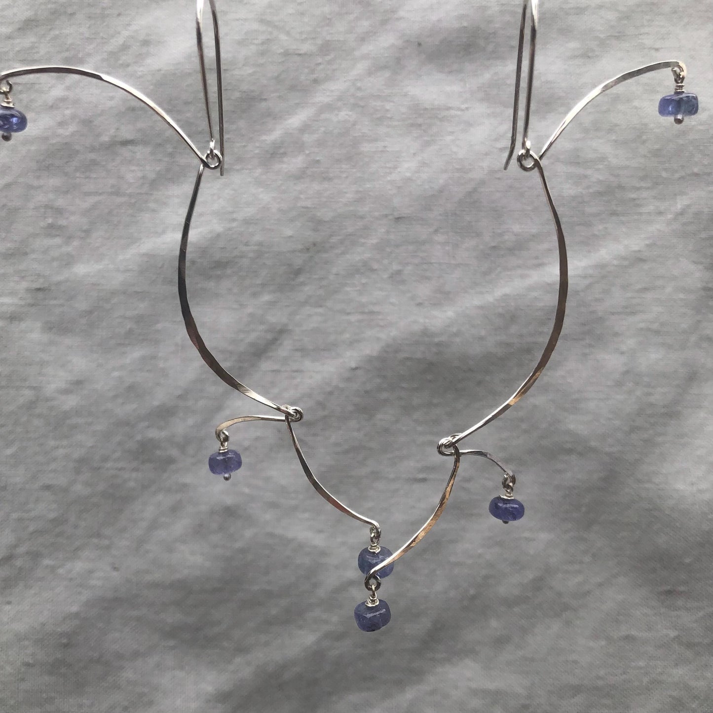 Kinetic sculptural tanzanite earrings in argentium sterling silver // Long Calder Earrings