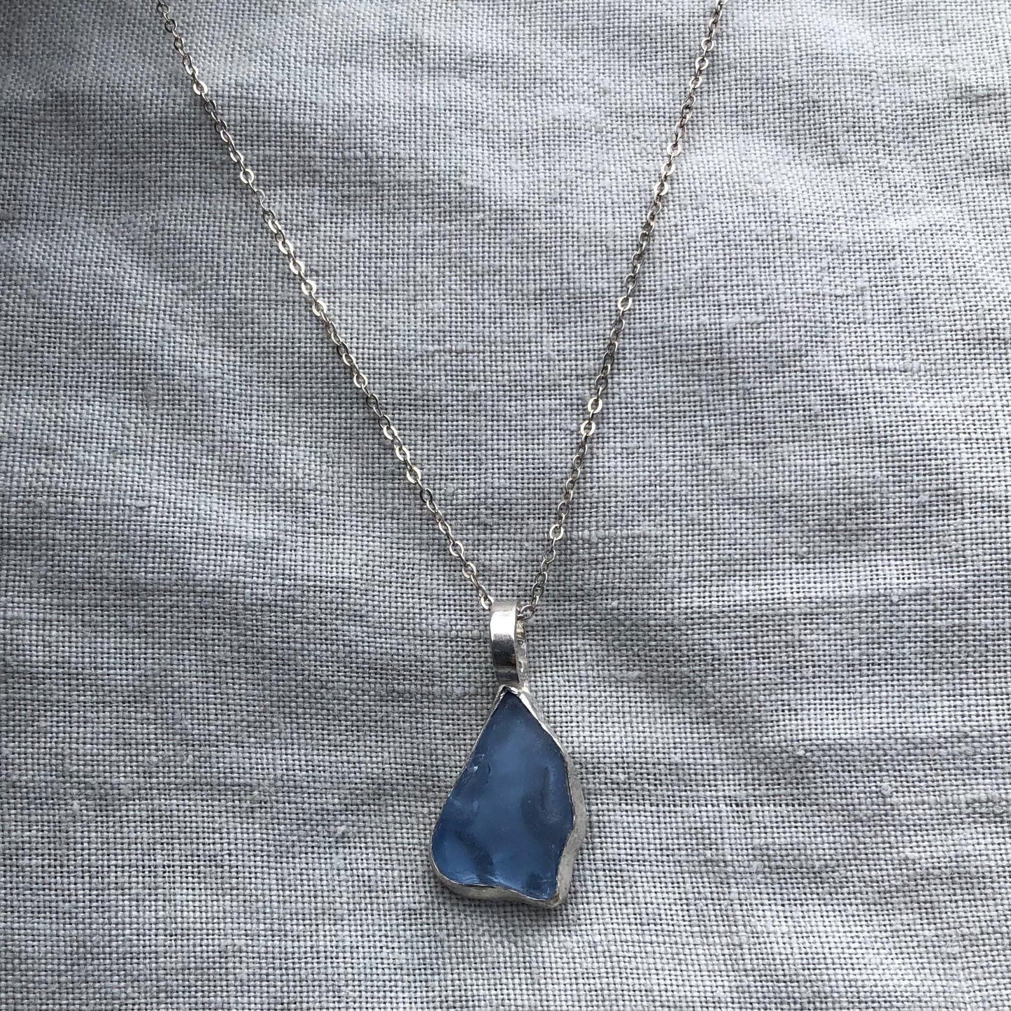 Light blue sea glass pendant in argentium sterling silver // Organic genuine beach glass necklace