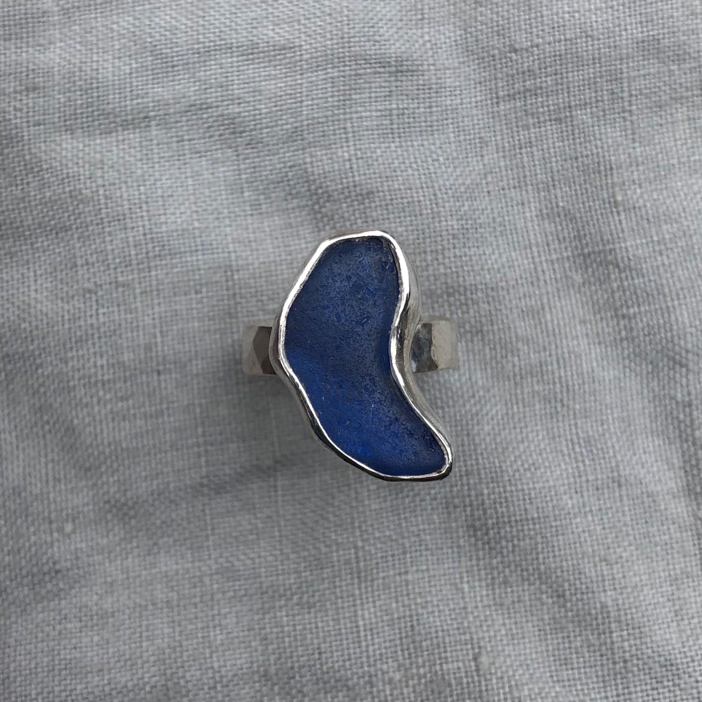 Freeform blue sea glass ring in argentium sterling silver // Bean-shaped found beach glass ring // U.S. size 5