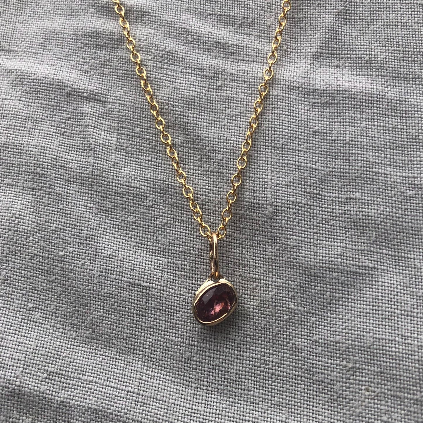 Solid gold padparadscha sapphire charm pendant // Asymmetrical unheated pink sapphire 14 karat gold necklace