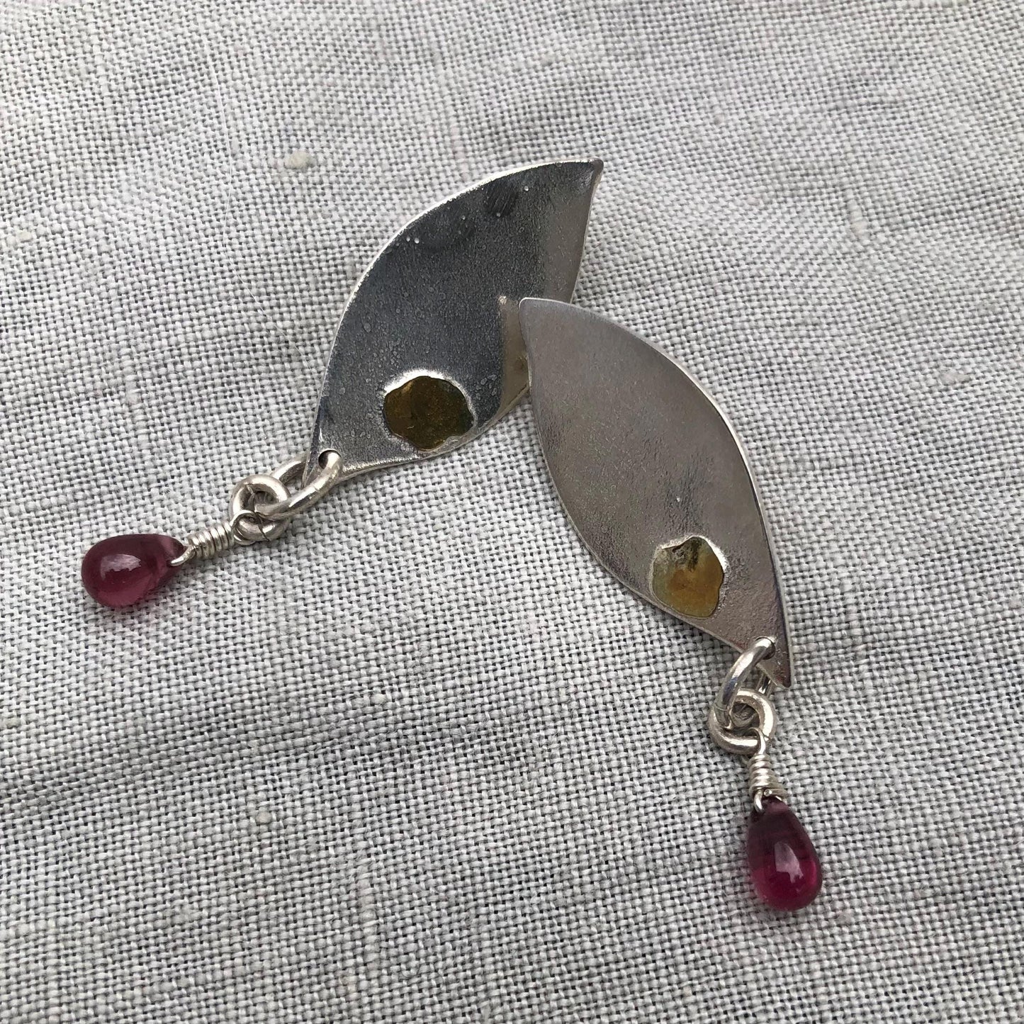 Mixed-metal garnet earrings in argentium sterling silver and 24 karat gold