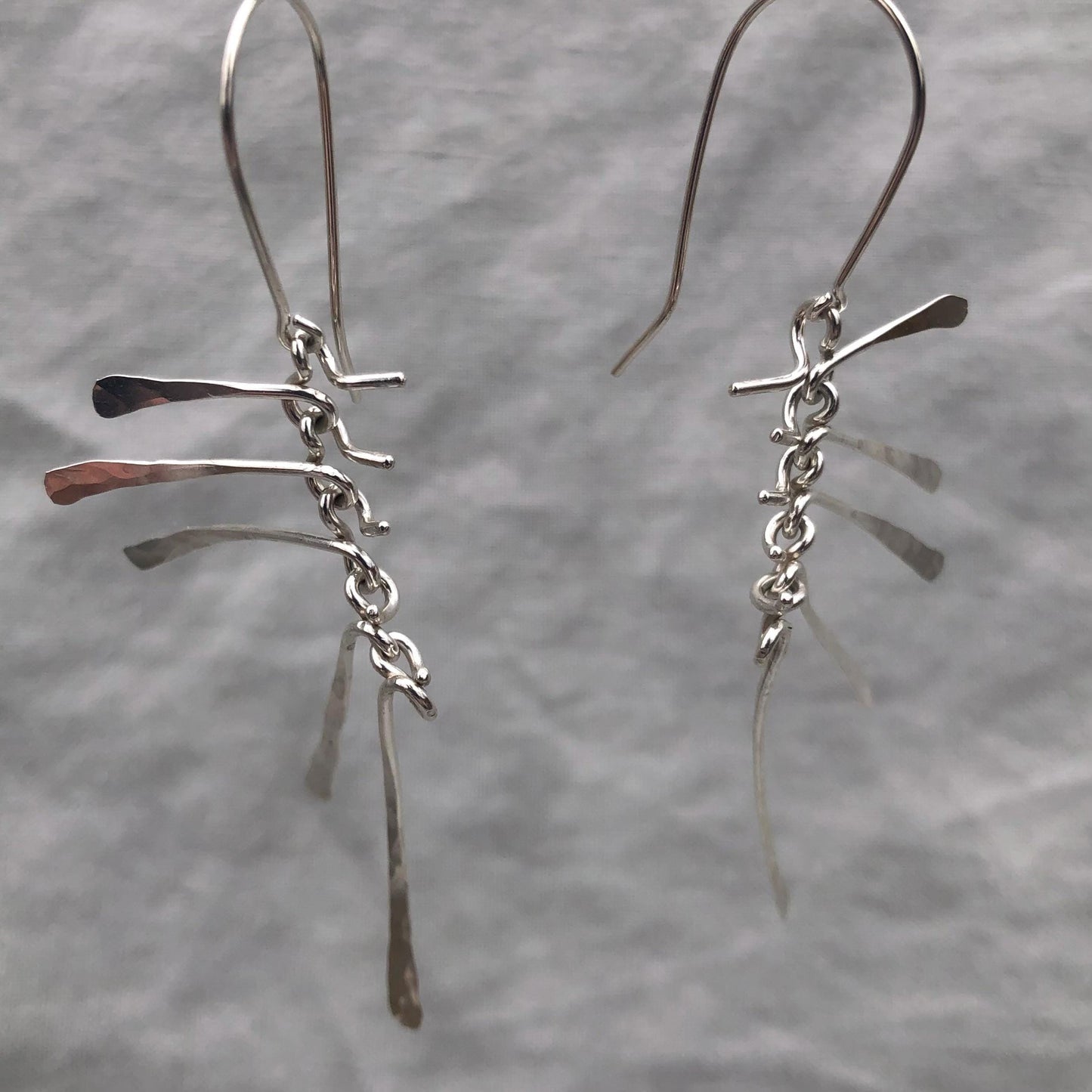 Kinetic sculptural earrings in argentium sterling silver // Bare Bones Earrings