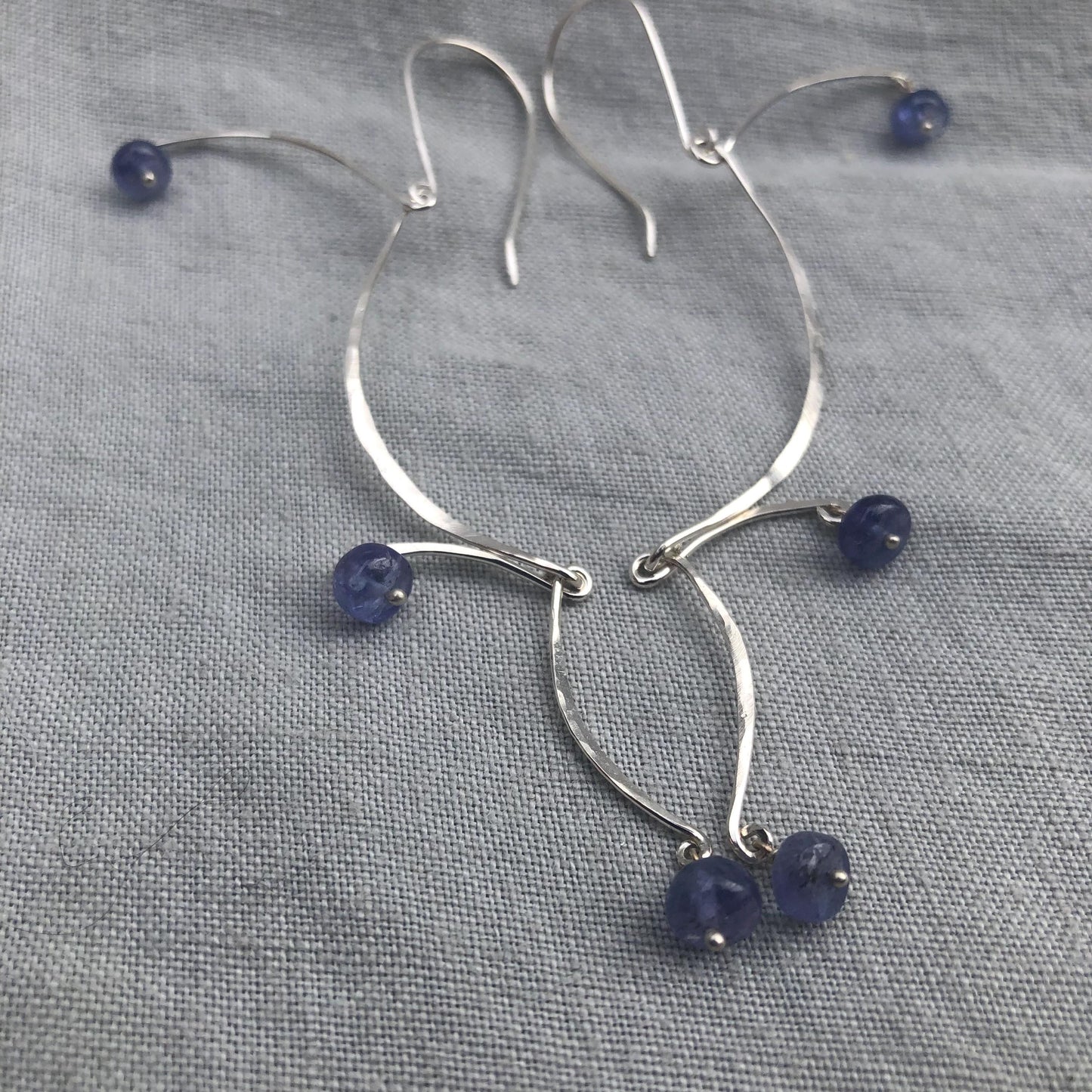 Kinetic sculptural tanzanite earrings in argentium sterling silver // Long Calder Earrings