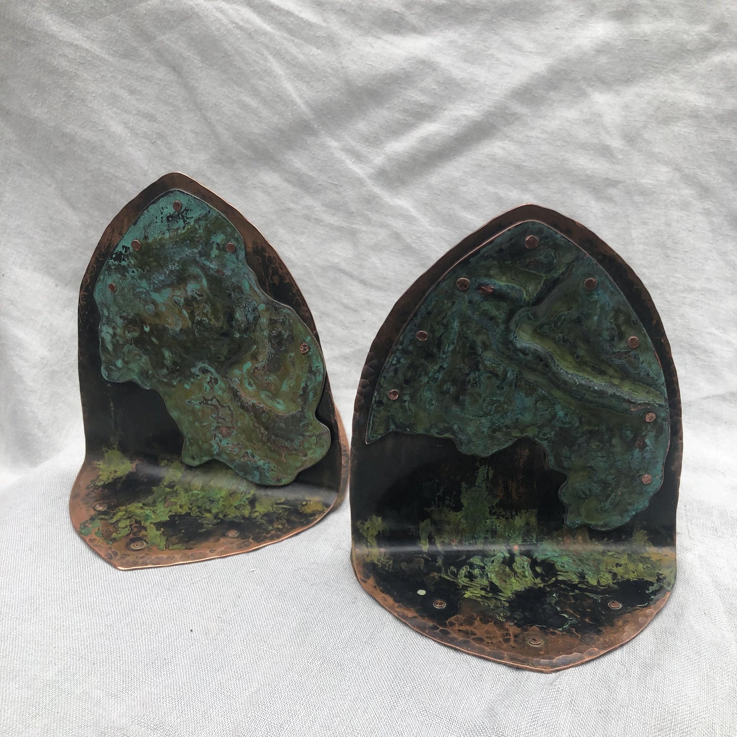 Riveted copper bookends with verdigris patina