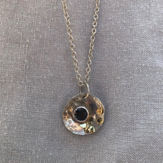 Natural earth-mined sapphire pendant in argentium silver and 24 karat gold