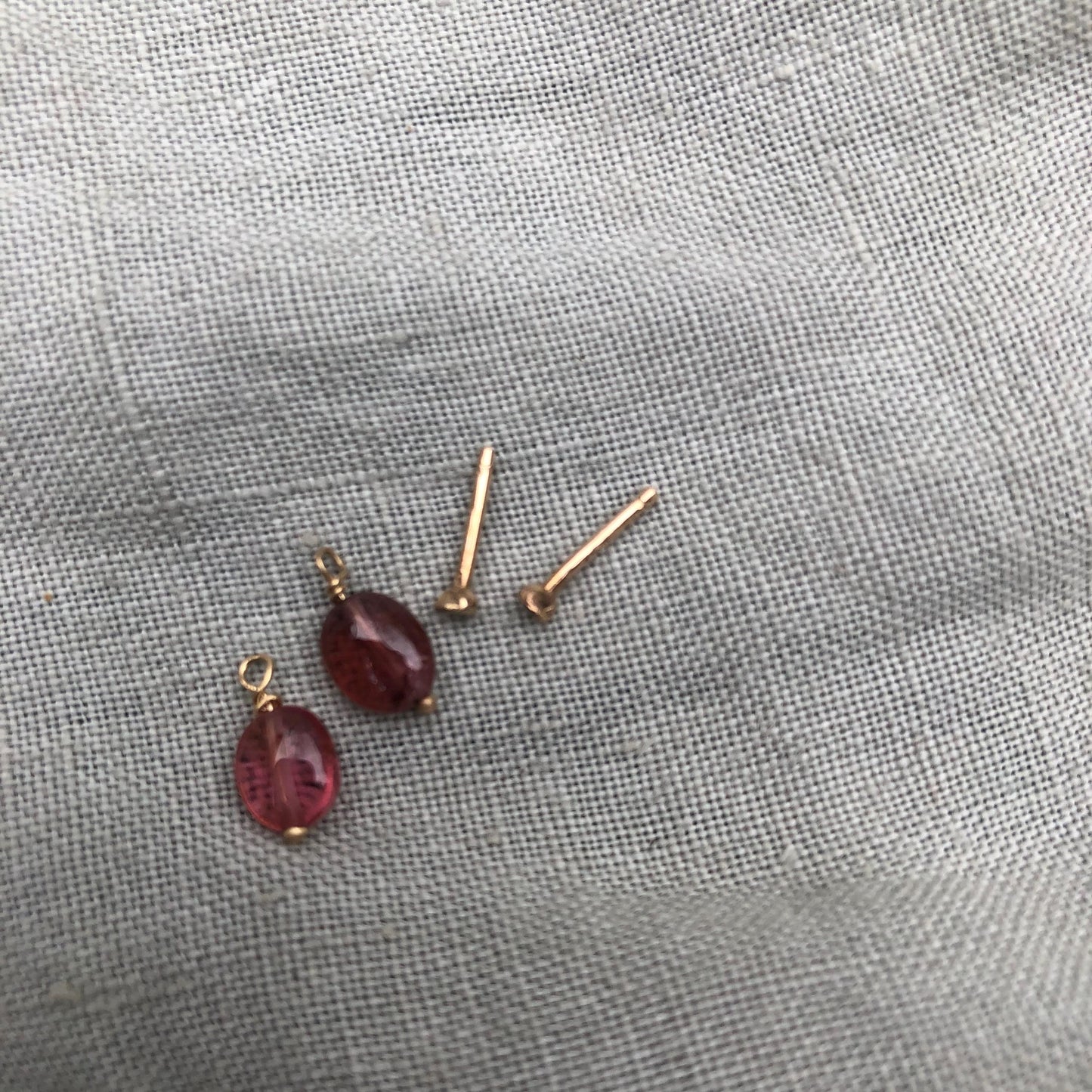Solid gold stud earrings with removable pink tourmaline gemstones