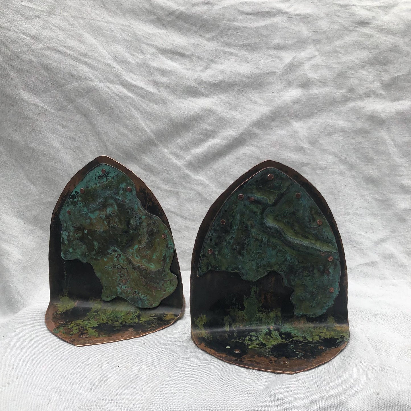 Riveted copper bookends with verdigris patina