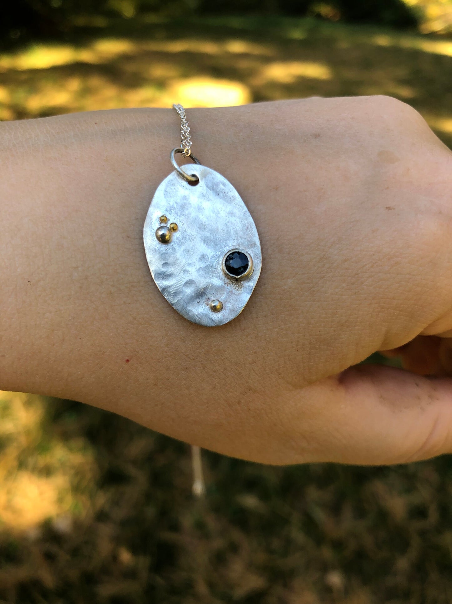 Sapphire tag pendant in argentium sterling silver and 24K gold