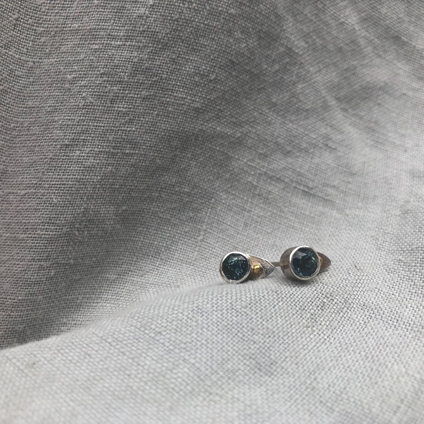 Natural earth-mined sapphire stud earrings in argentium sterling silver and 24 karat gold