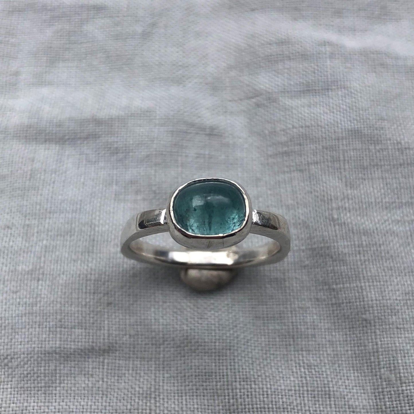 Lagoon blue tourmaline cabochon ring in argentium sterling silver // Sky blue tourmaline ring // U.S. size 8 1/2