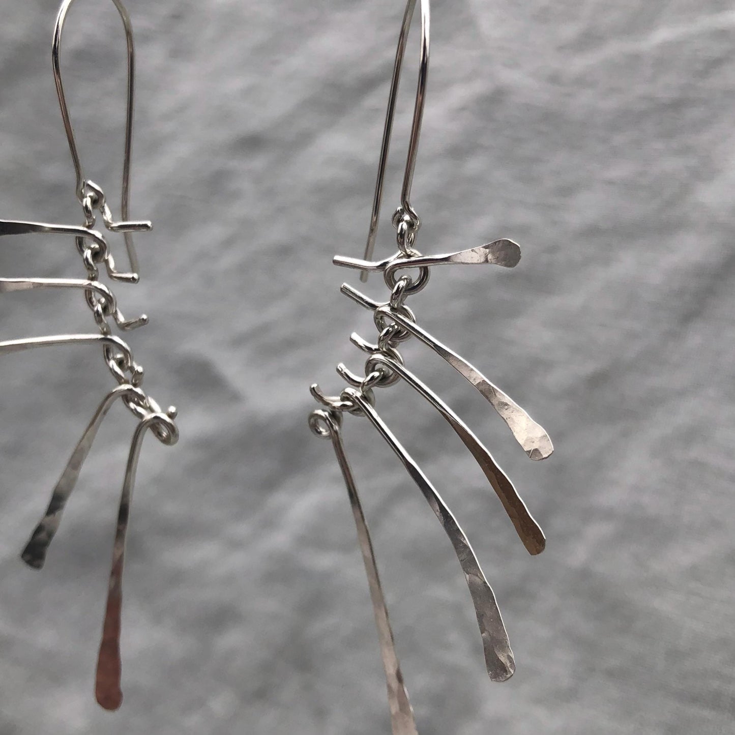Kinetic sculptural earrings in argentium sterling silver // Bare Bones Earrings