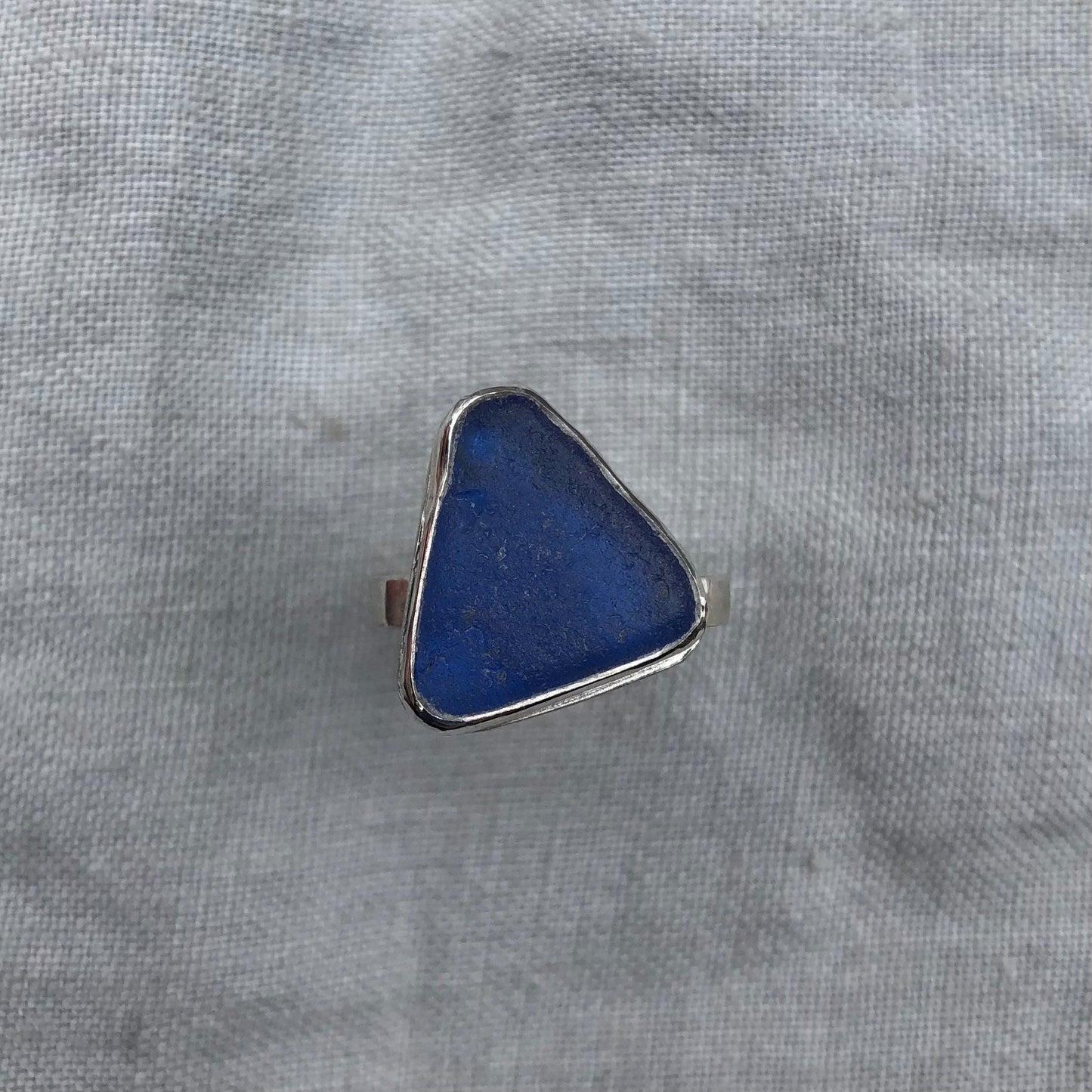 Blue sea glass ring in argentium sterling silver // Found beach glass ring with a contoured band // U.S. size 5