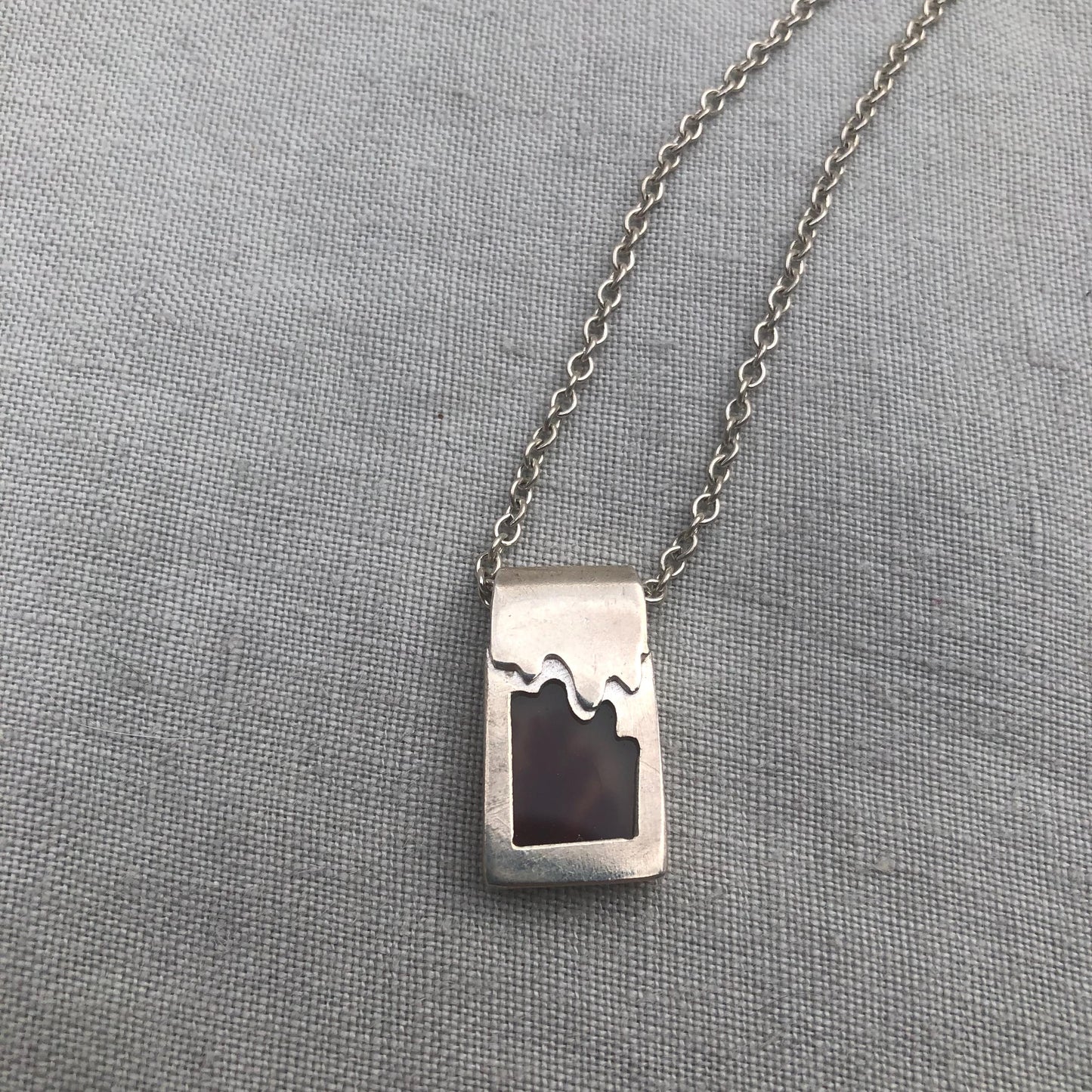 Dendritic agate pendant in argentium sterling silver // Red picture agate with open back
