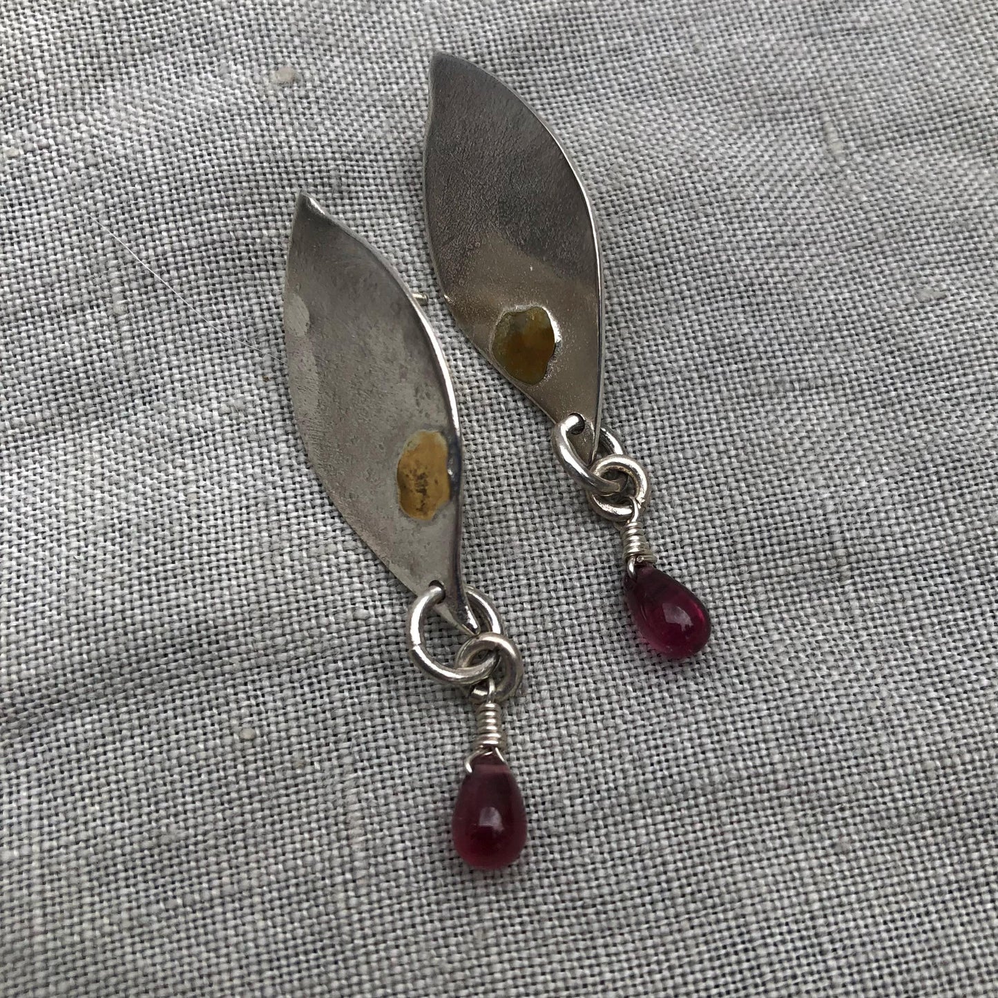 Mixed-metal garnet earrings in argentium sterling silver and 24 karat gold