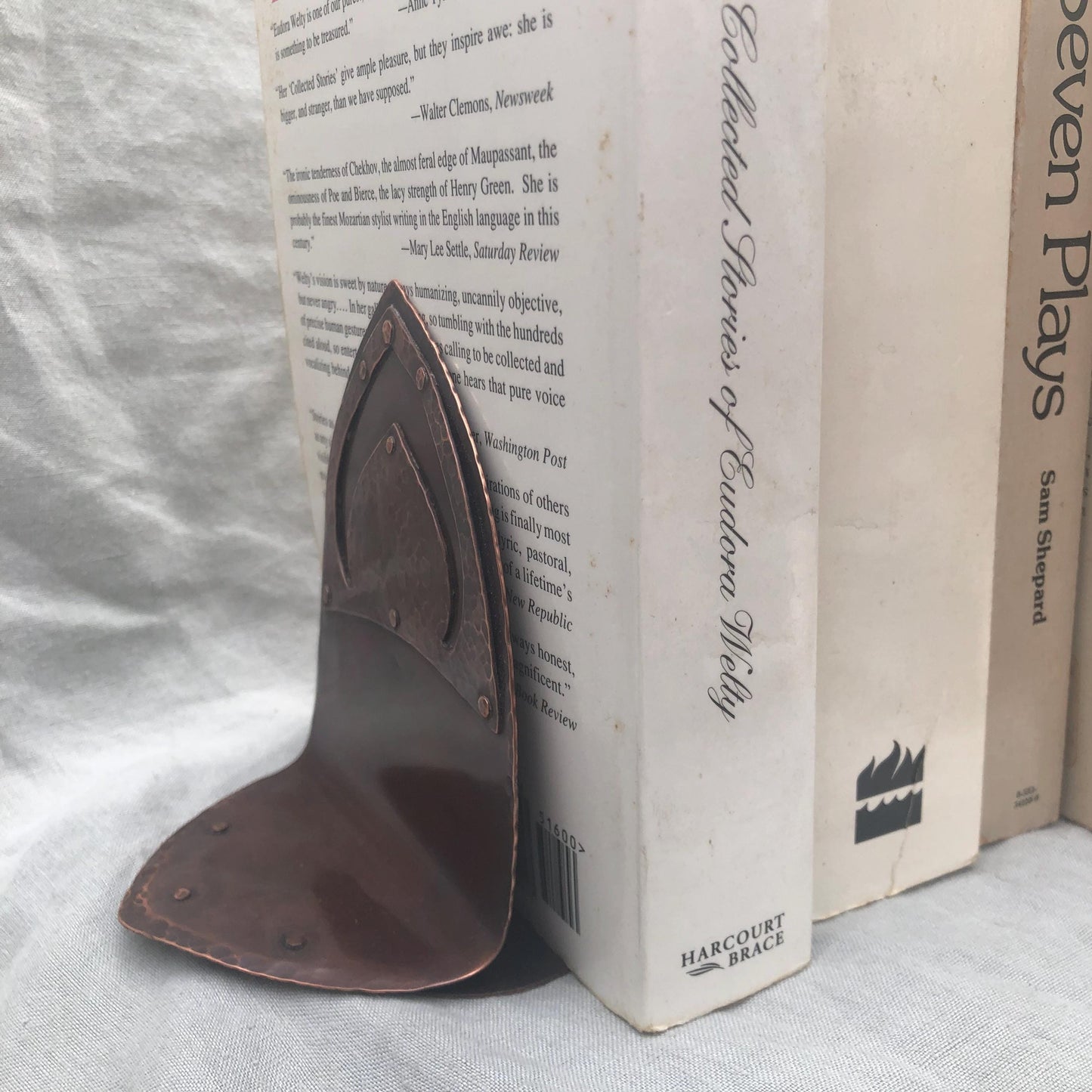 Riveted hammered copper bookends with warm copper patina