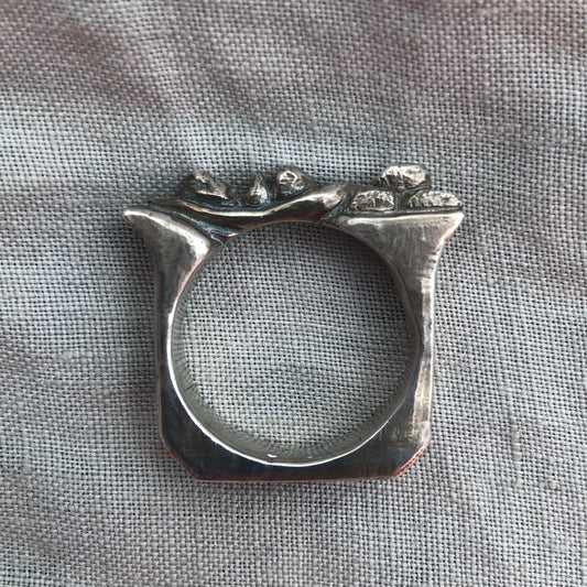 Snake on a rock wall ring in argentium sterling silver // U.S. size 11