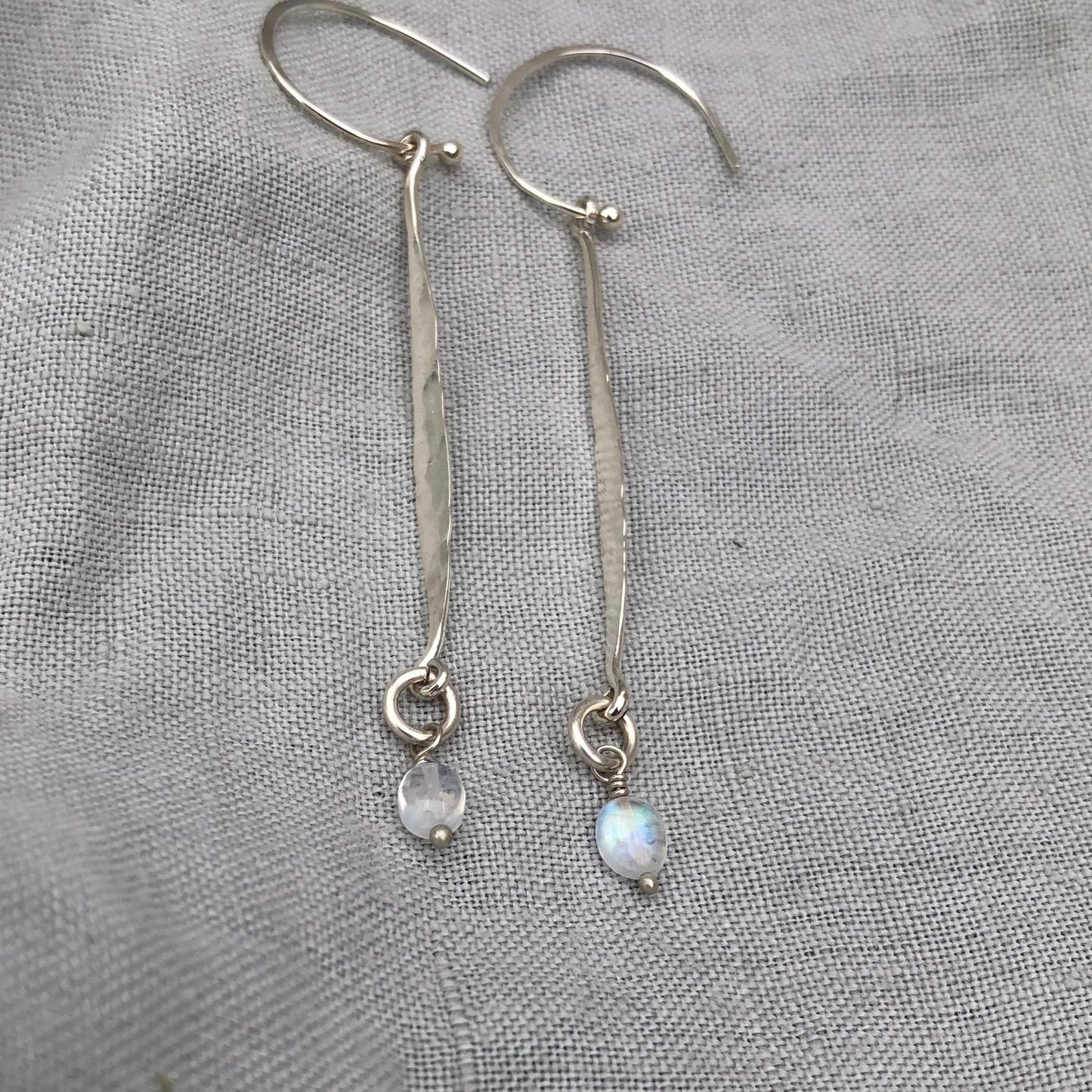 Hammered drop earrings in argentium sterling silver with moonstone // Kinetic sculptural earrings // June birthstone earrings