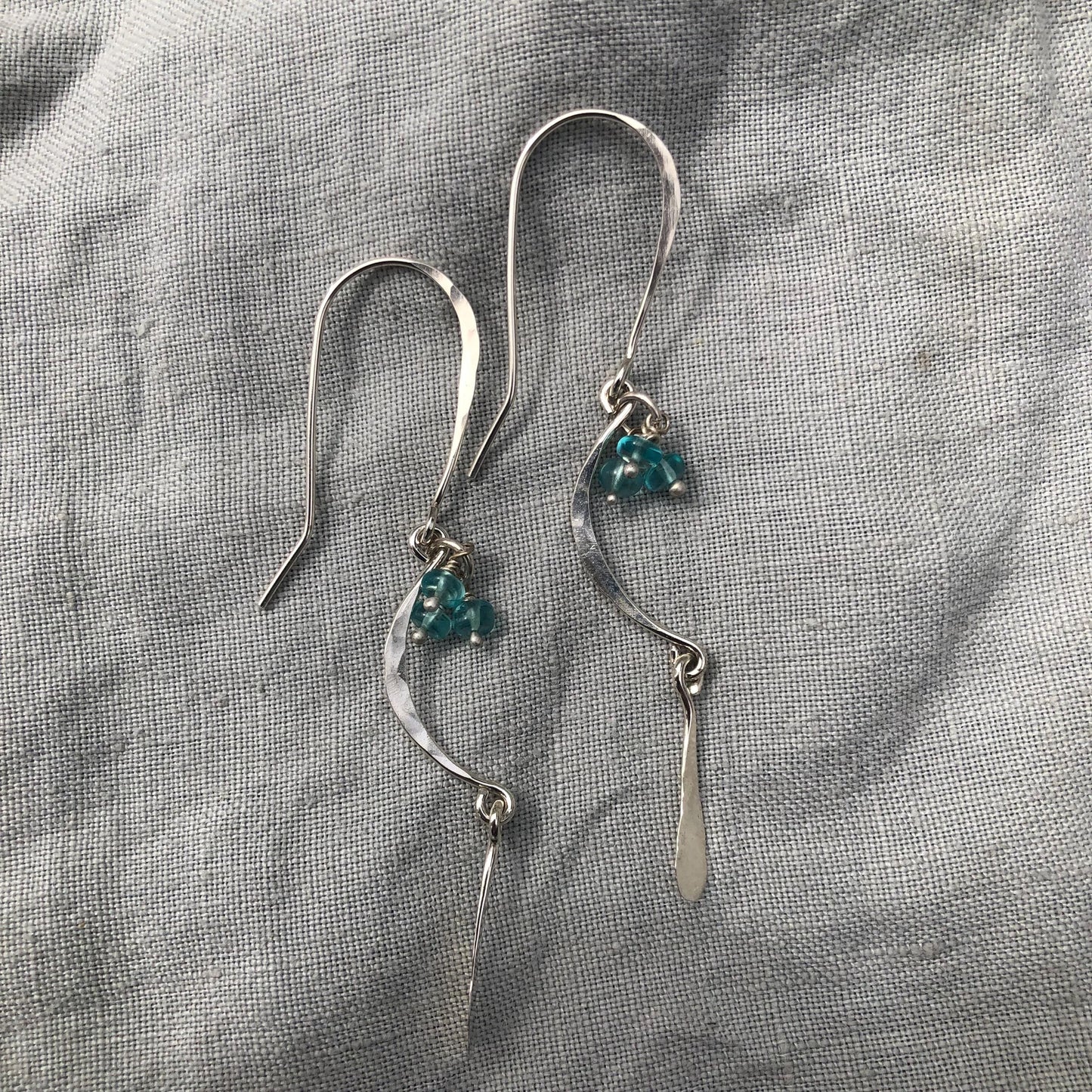 C-curve earrings in argentium sterling silver with bright blue apatite