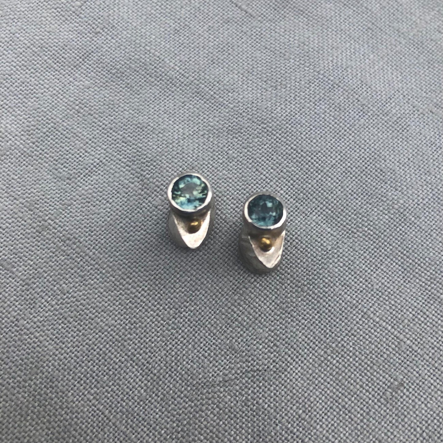 Natural earth-mined sapphire stud earrings in argentium sterling silver and 24 karat gold