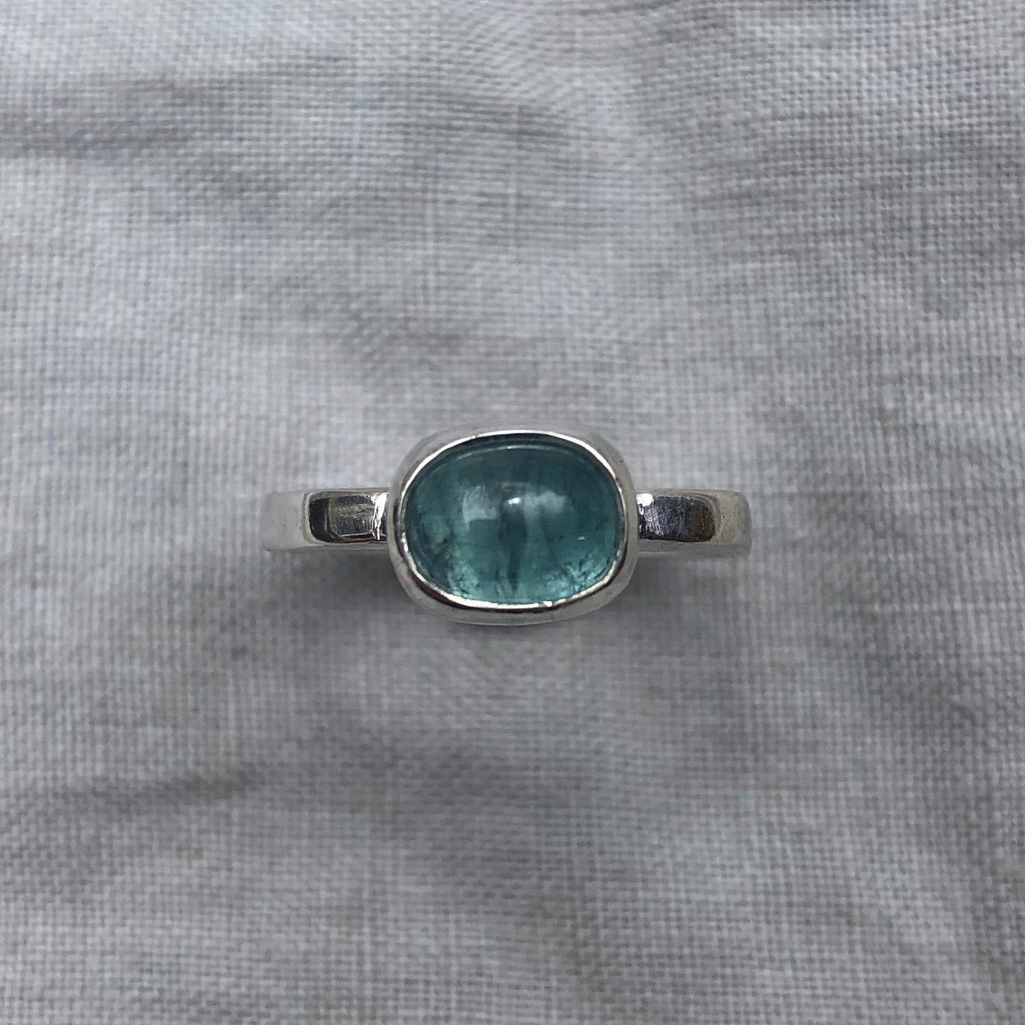 Lagoon blue tourmaline cabochon ring in argentium sterling silver // Sky blue tourmaline ring // U.S. size 8 1/2