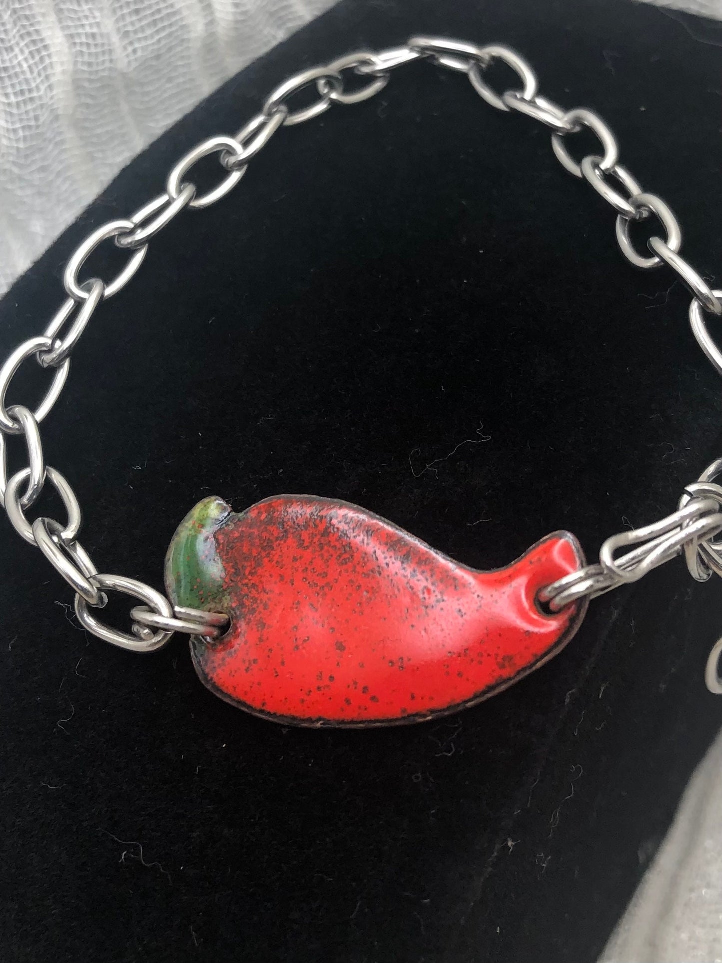 Red pepper bracelet in vitreous enamel, copper, and stainless steel