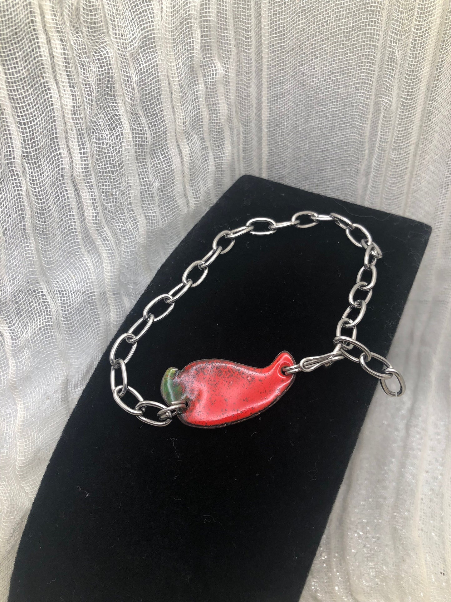 Red pepper bracelet in vitreous enamel, copper, and stainless steel