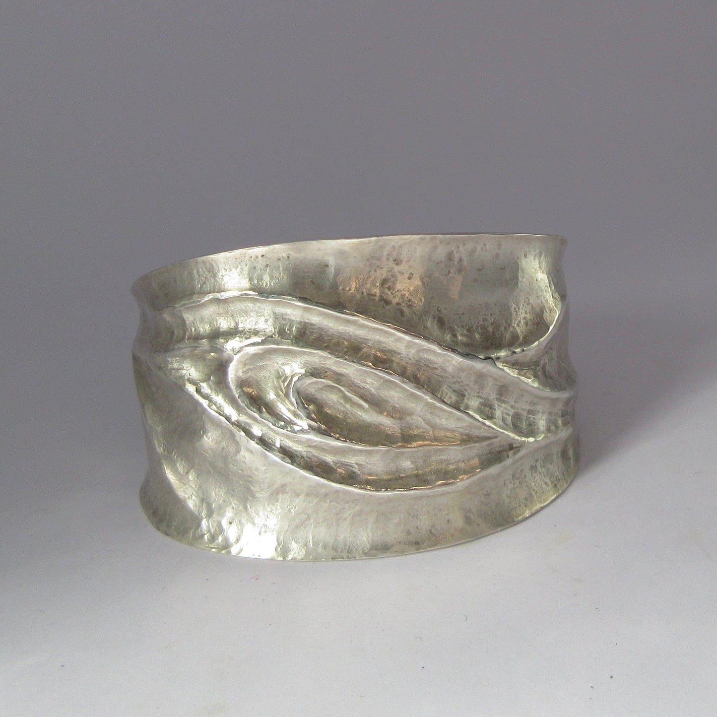 Breaking wave cuff bracelet in chased and repoussé argentium sterling silver